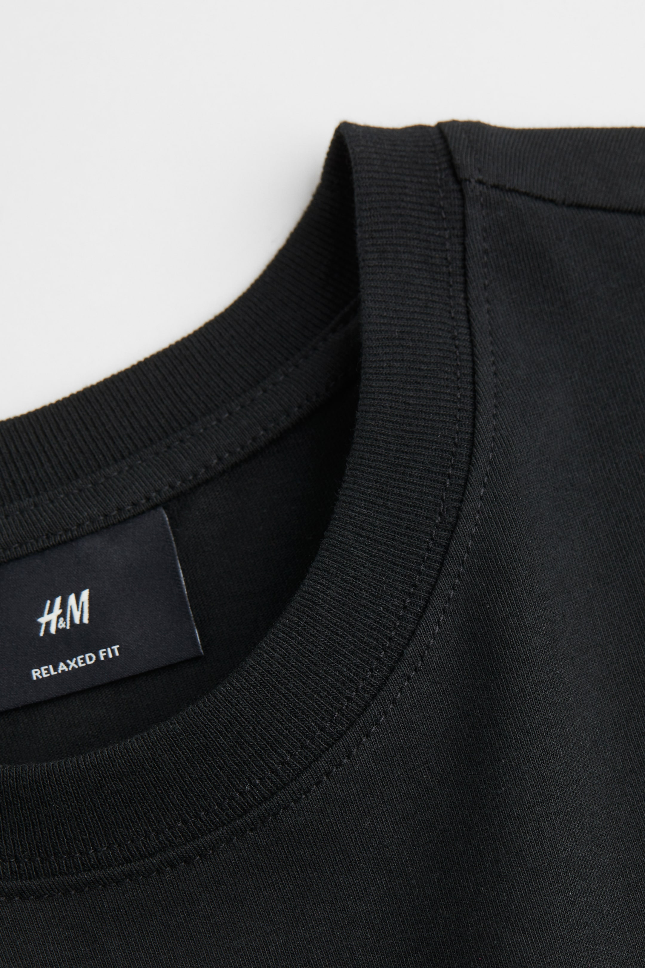 הצגת תמונה גדולה יותר: Loose Fit Printed T-shirt - שחור/שמש - Men | H&M IL 2