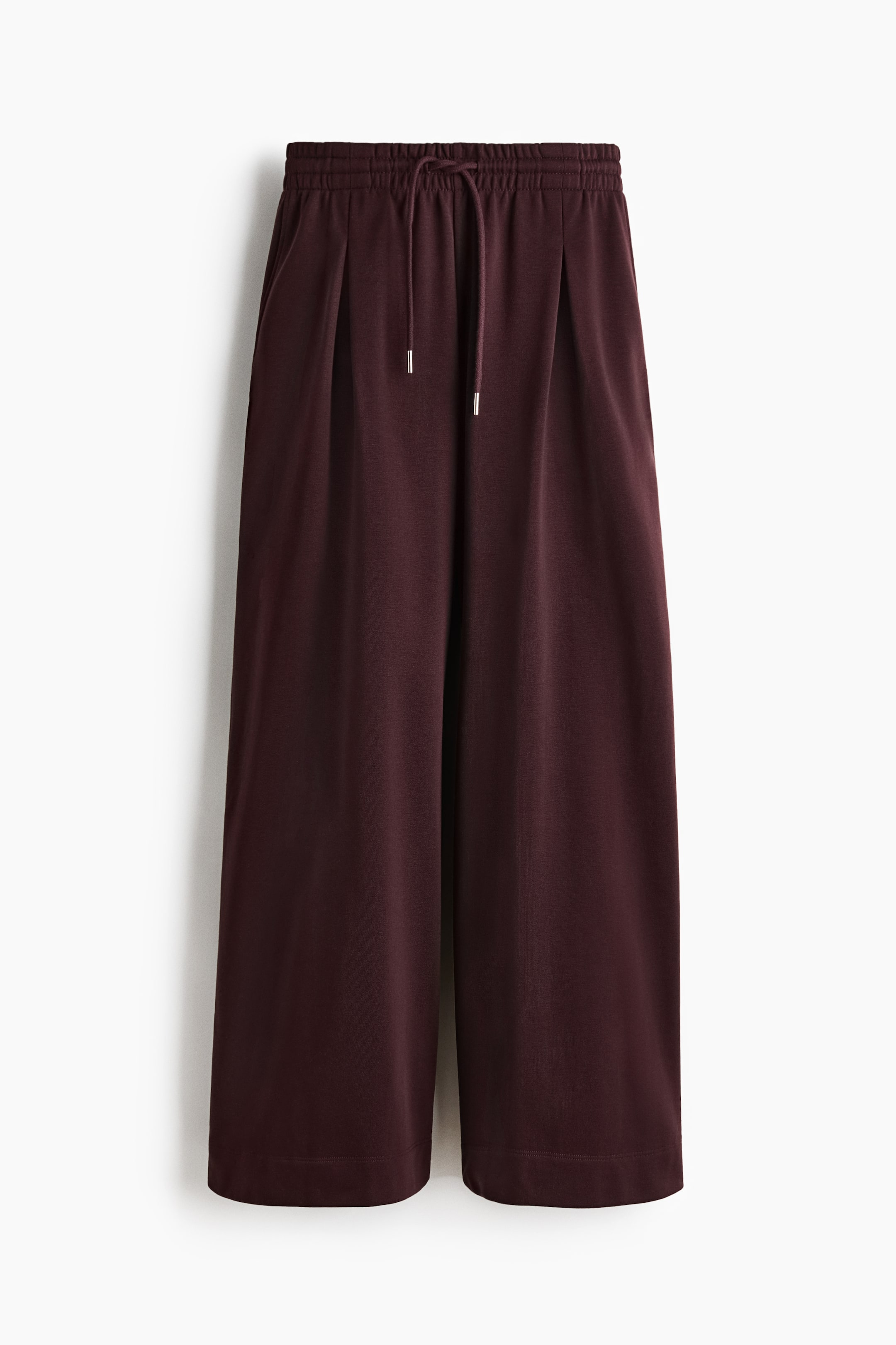 Pantalon avec cordon de serrage et plis