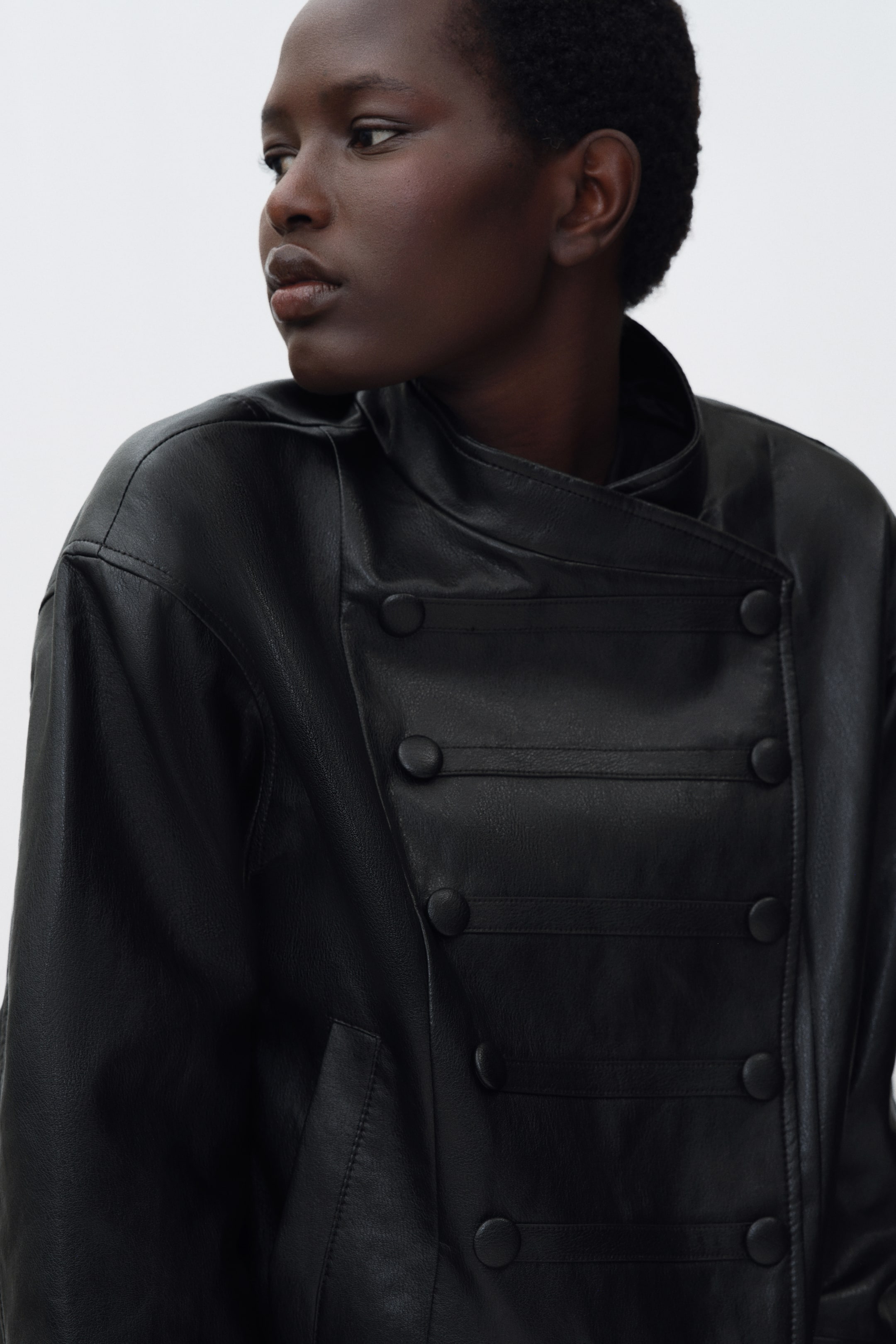 Veste en tissu enduit avec détails à boutons