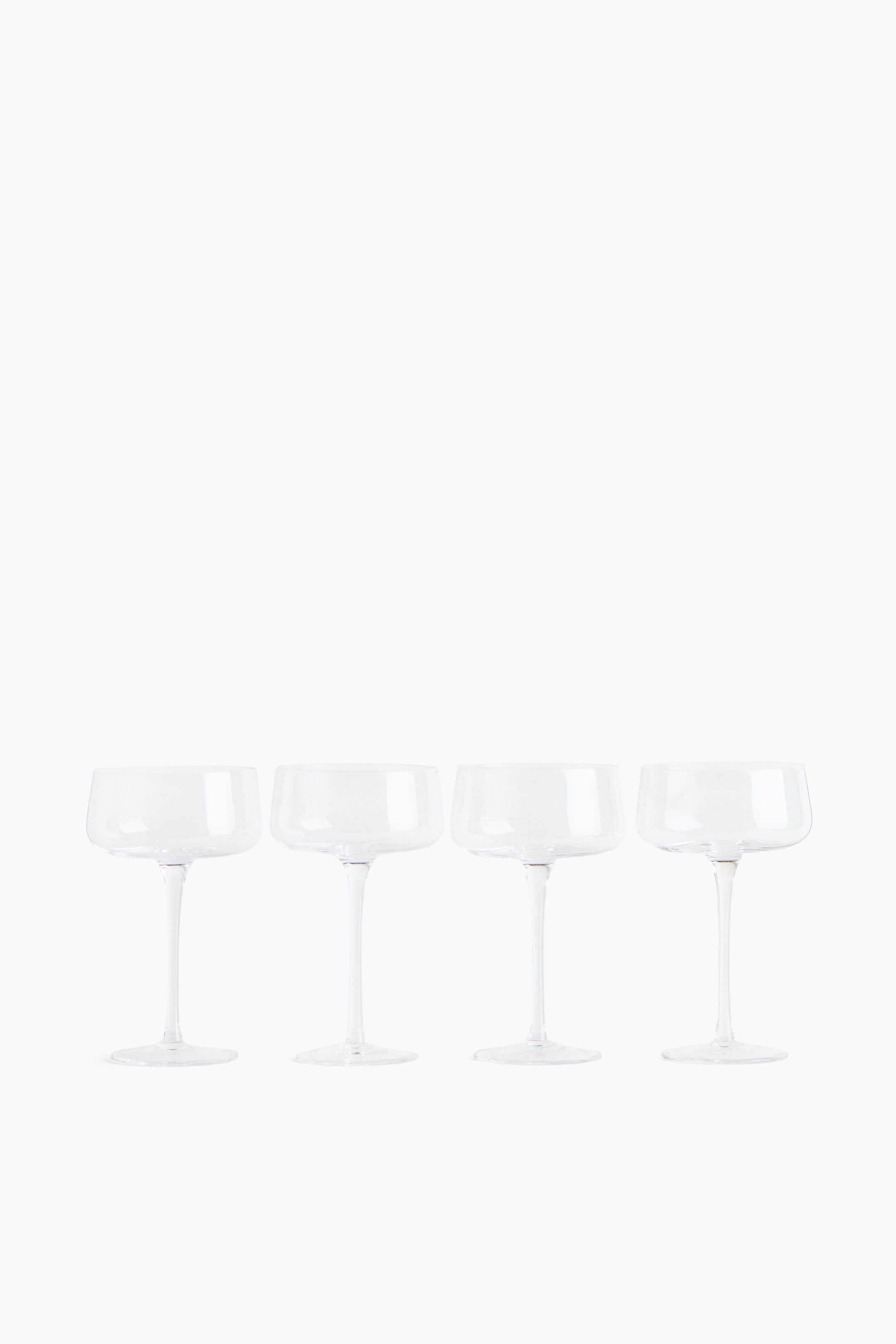 Ver imagen más grande: Pack de 4 copas coupe con tallo alto - Transparente - HOME | H&M ES 1