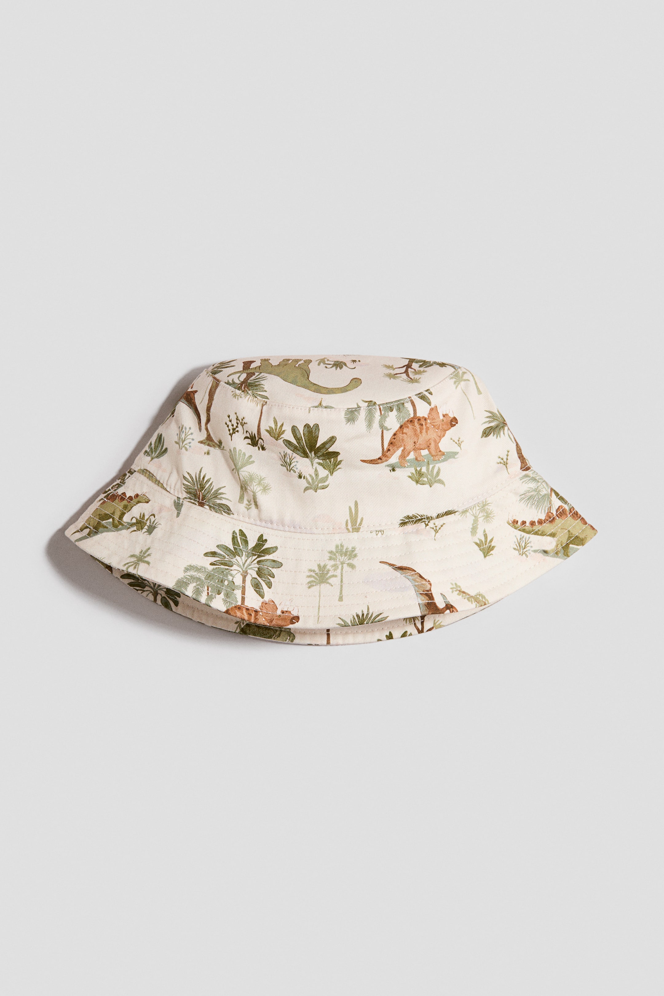 View larger image: Printed bucket hat - Light beige/Dinosaurs - Kids | H&M IE 1