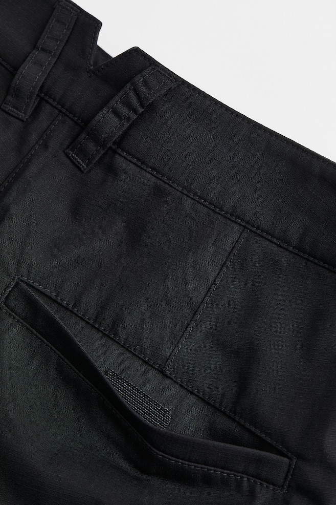 Water-repellent outdoor trousers - Black/Dark khaki green/Sage green/Dark orange - 11