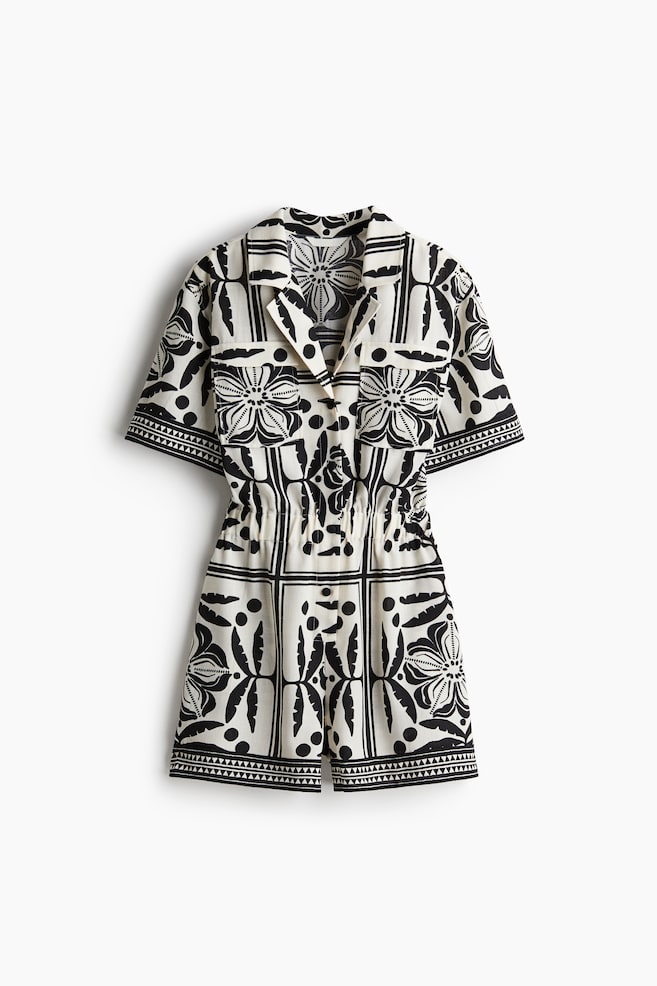 Kurzer Jumpsuit - Cremefarben/Schwarz gemustert - 1