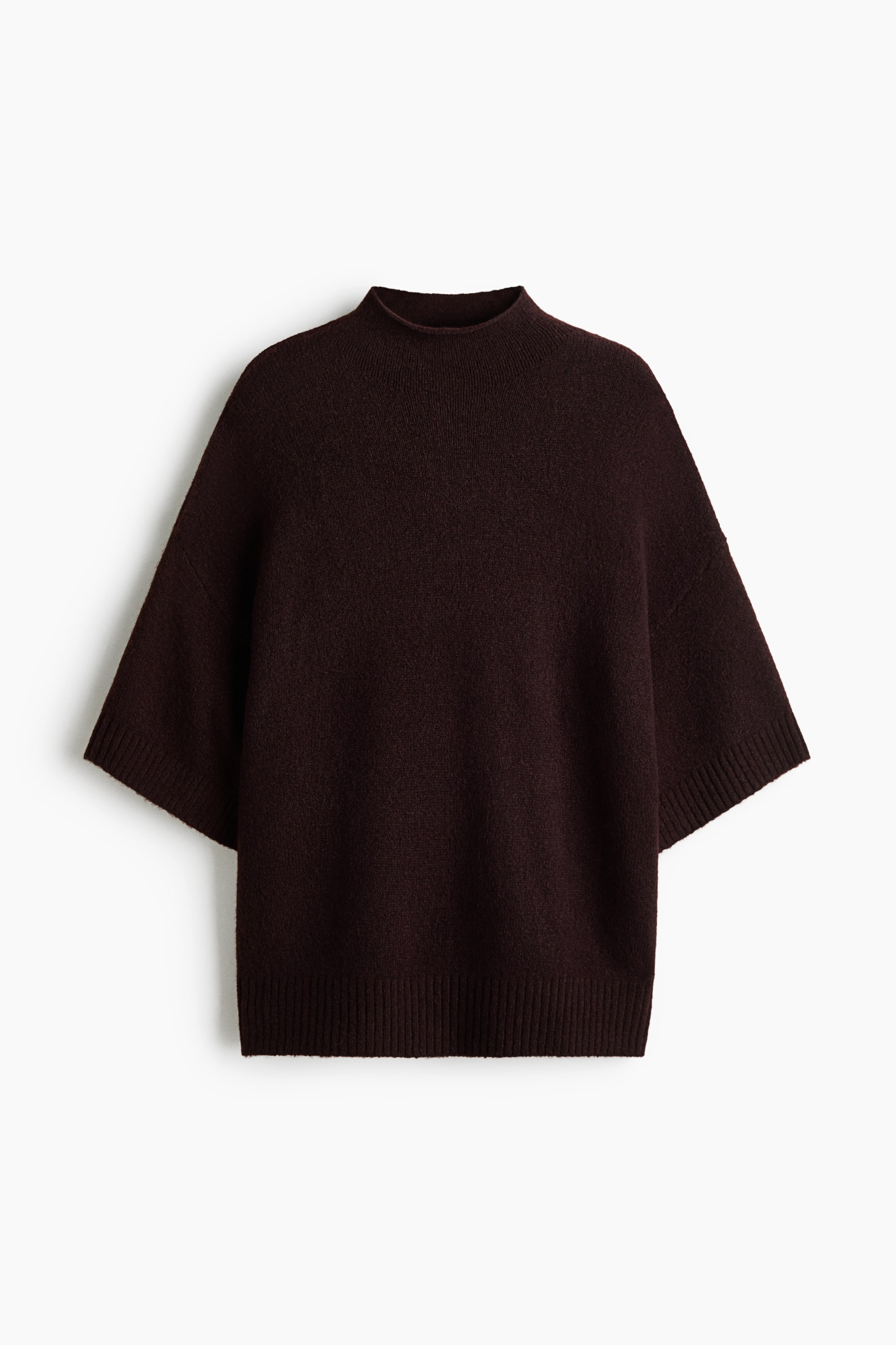 View larger image: A dark brown knit sweater is shown from the front, featuring a mock neck, dropped shoulders, and wide elbow-length sleeves with ribbed cuffs. This boxy-fit top showcases a soft, textured finish and a ribbed hem.