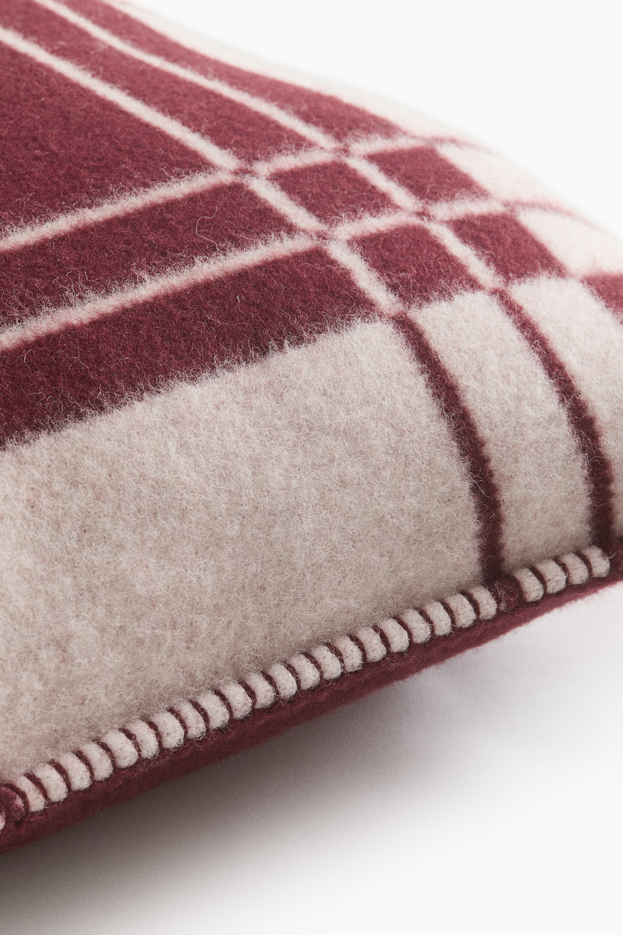 Housse de coussin en laine mélangée