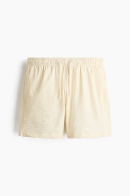 Badshorts i bäckebölja