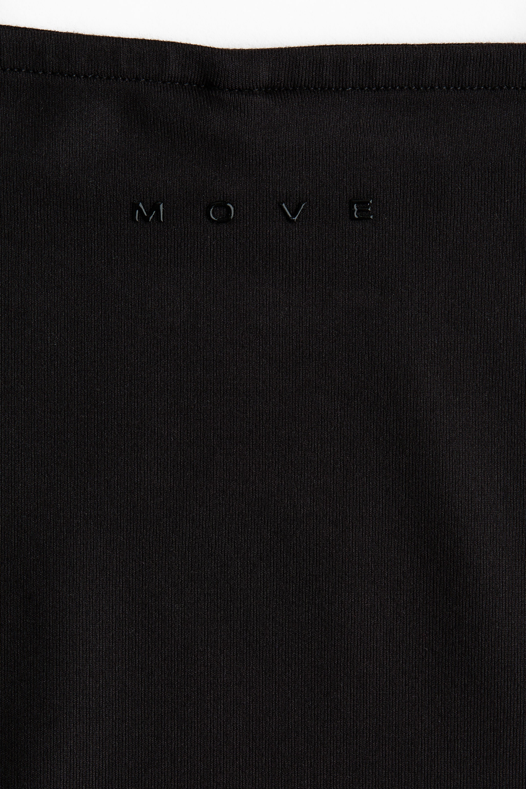 Ampliar la imagen: Sports top with SoftMove™ - Negro - Kids | H&M MX 3