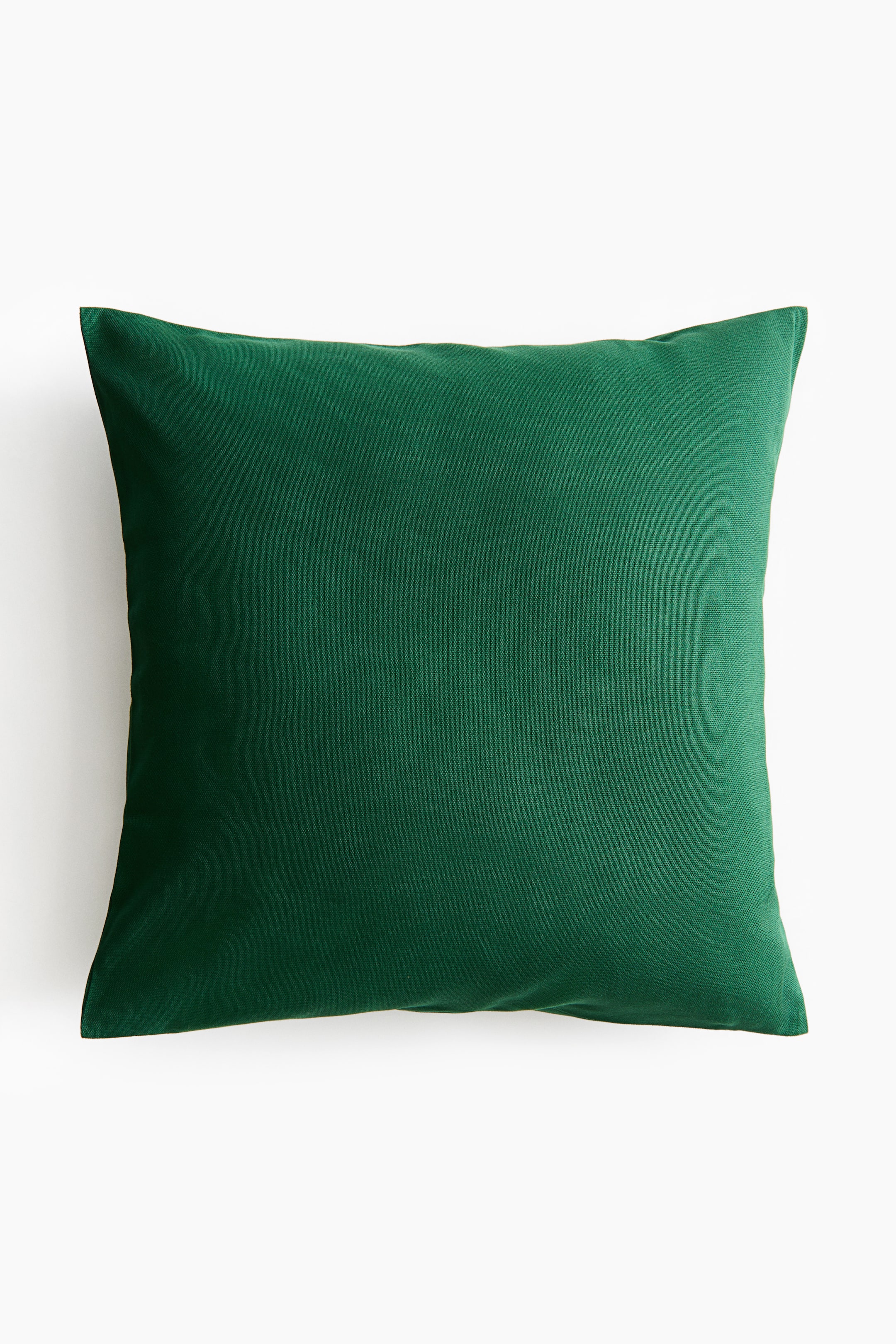 View larger image: A dark green cotton canvas cushion cover is facing front, featuring a hidden zipper.