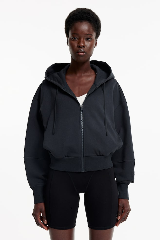 DryMove™ Zip-through sports hoodie - Black/Cream - 1