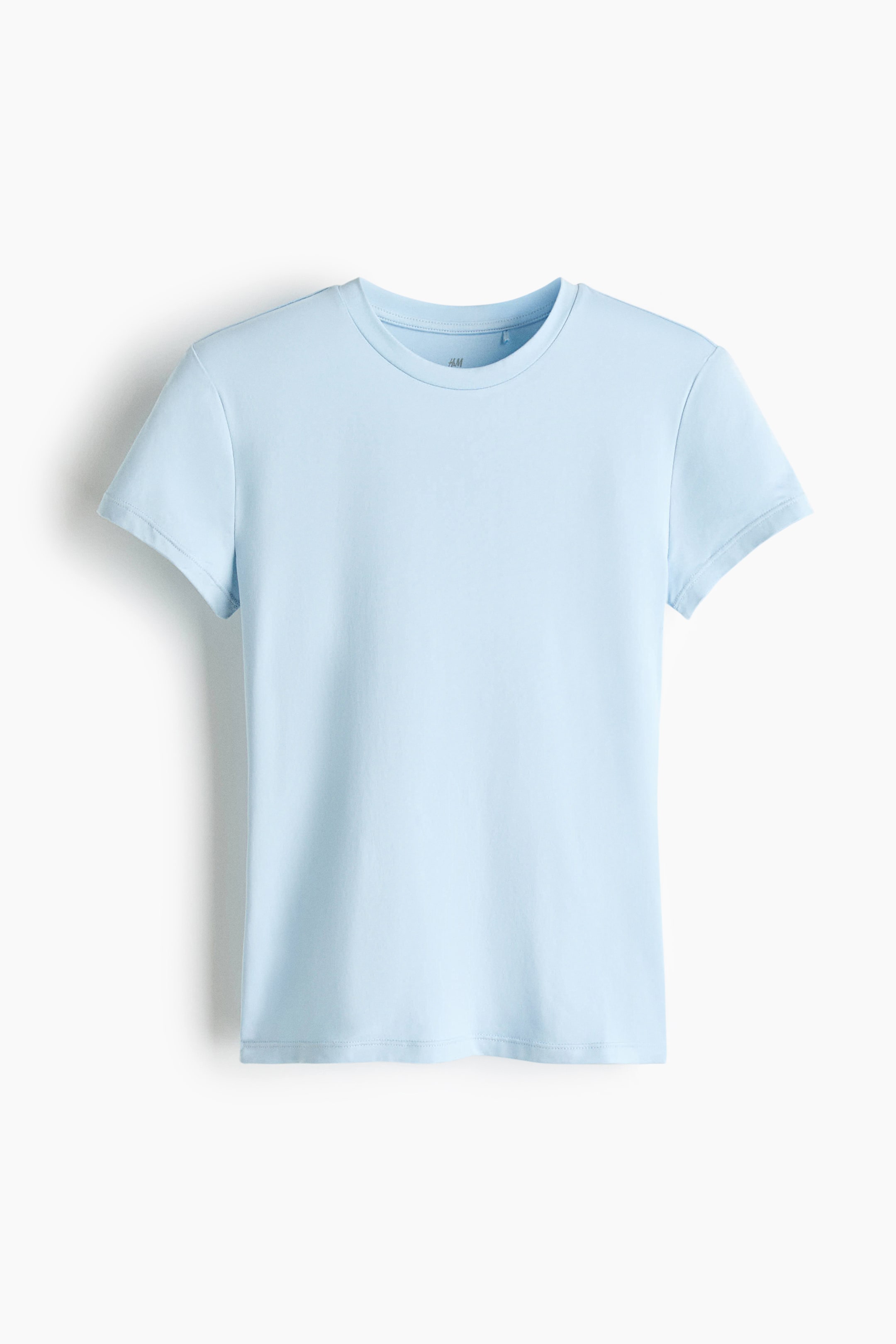 View larger image: A light blue T-shirt is laid flat, facing forward, featuring a ribbed crew neck and short sleeves.