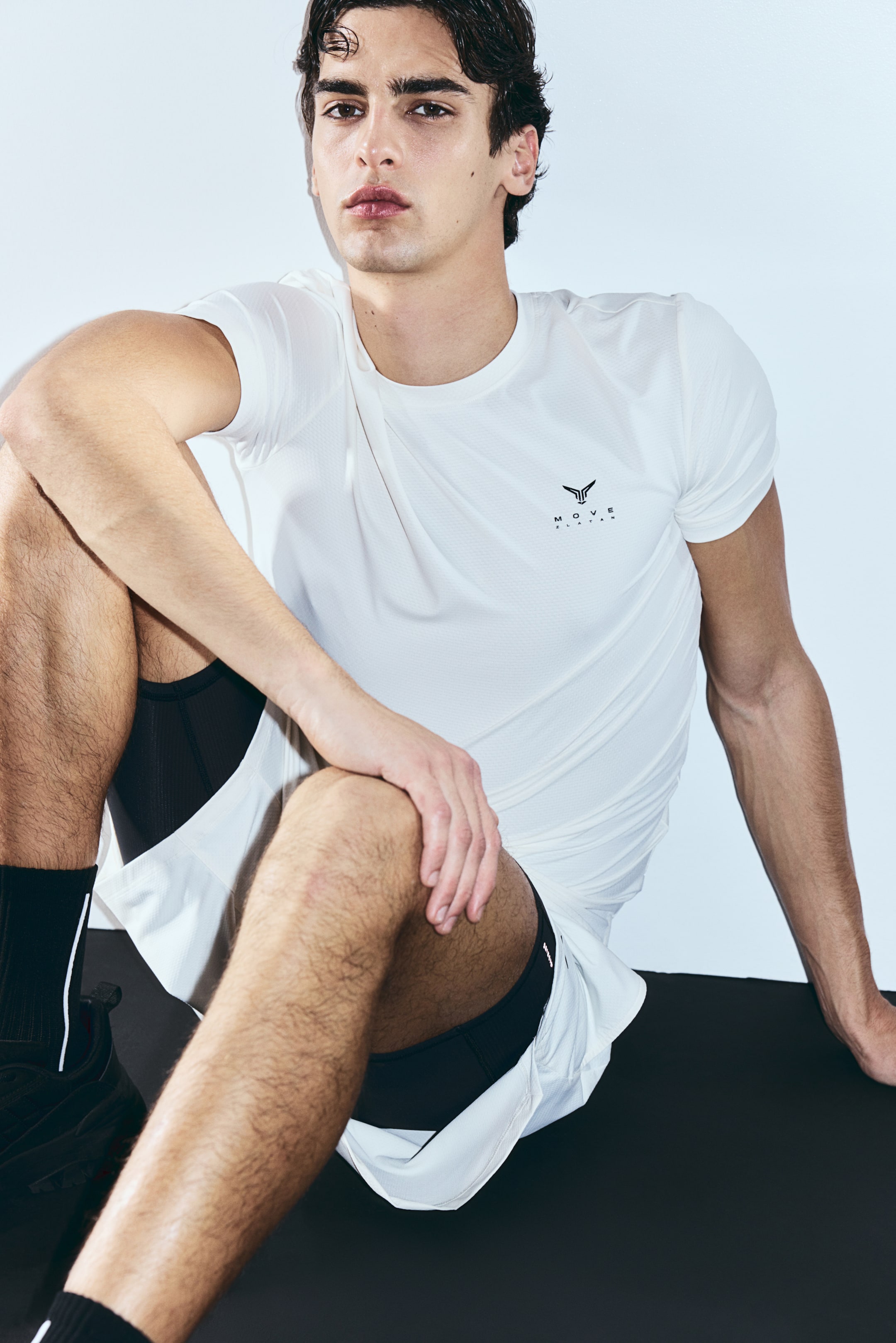 View larger image: Muscle Fit Sports T-shirt with DryMove™ - Cream/Move Zlatan - Men | H&M IN 1
