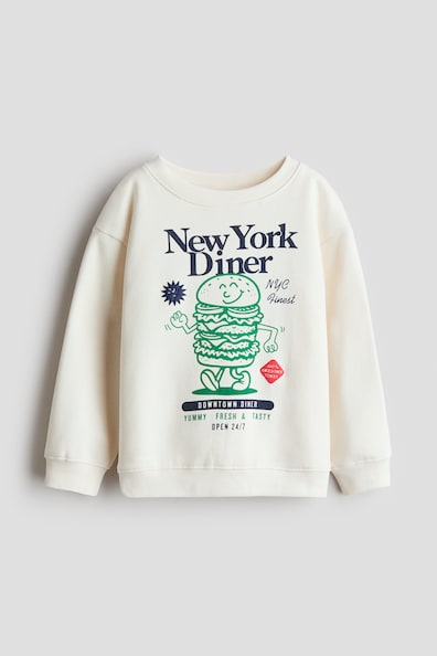 プリント裏起毛スウェットシャツ