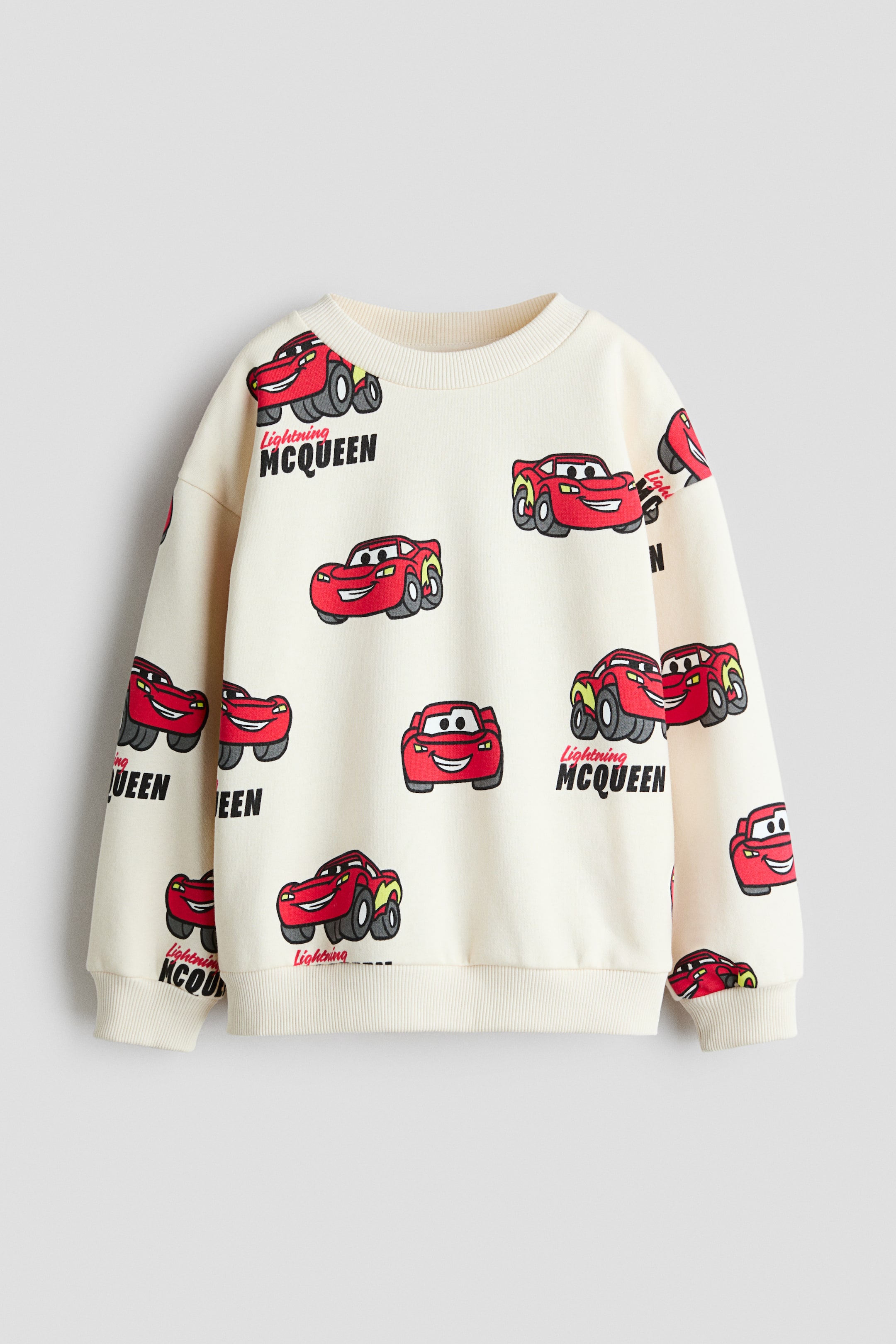 View larger image: Printed brushed-inside sweatshirt - Light beige/Cars - Kids | H&M 1