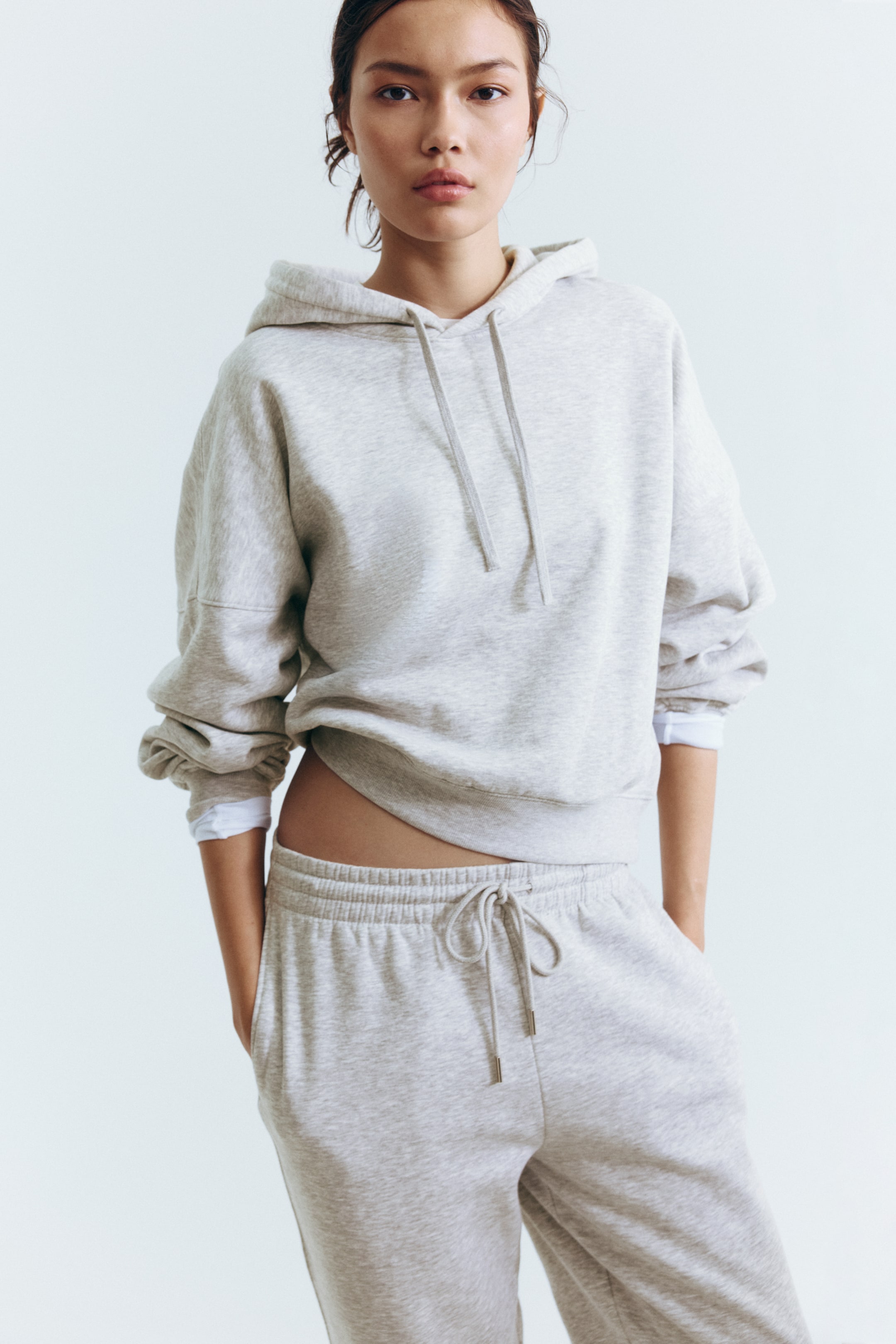 Ver imagen más grande: Sudadera con capucha - Gris claro jaspeado - MUJER | H&M ES 1