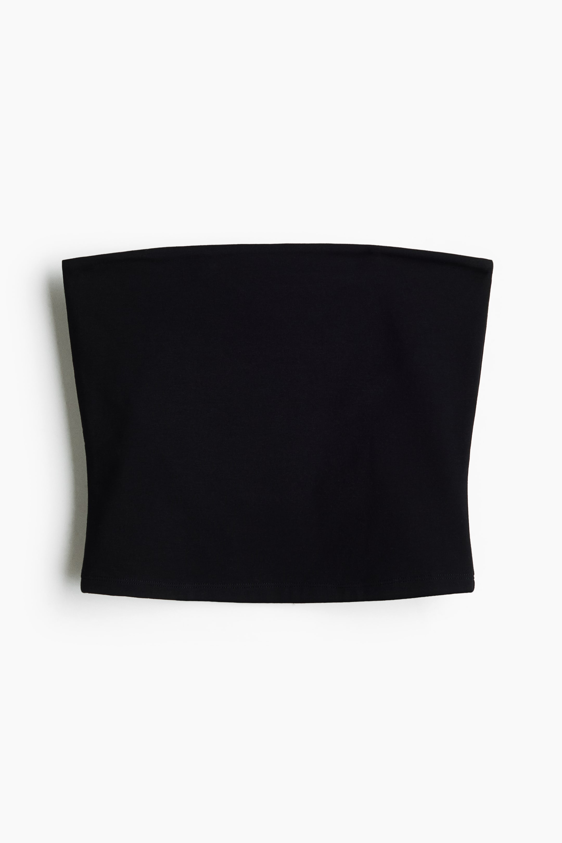 View larger image: "A black bandeau top showcases a sleek, strapless design from a frontal perspective. It highlights a straight neckline and a straight hem."