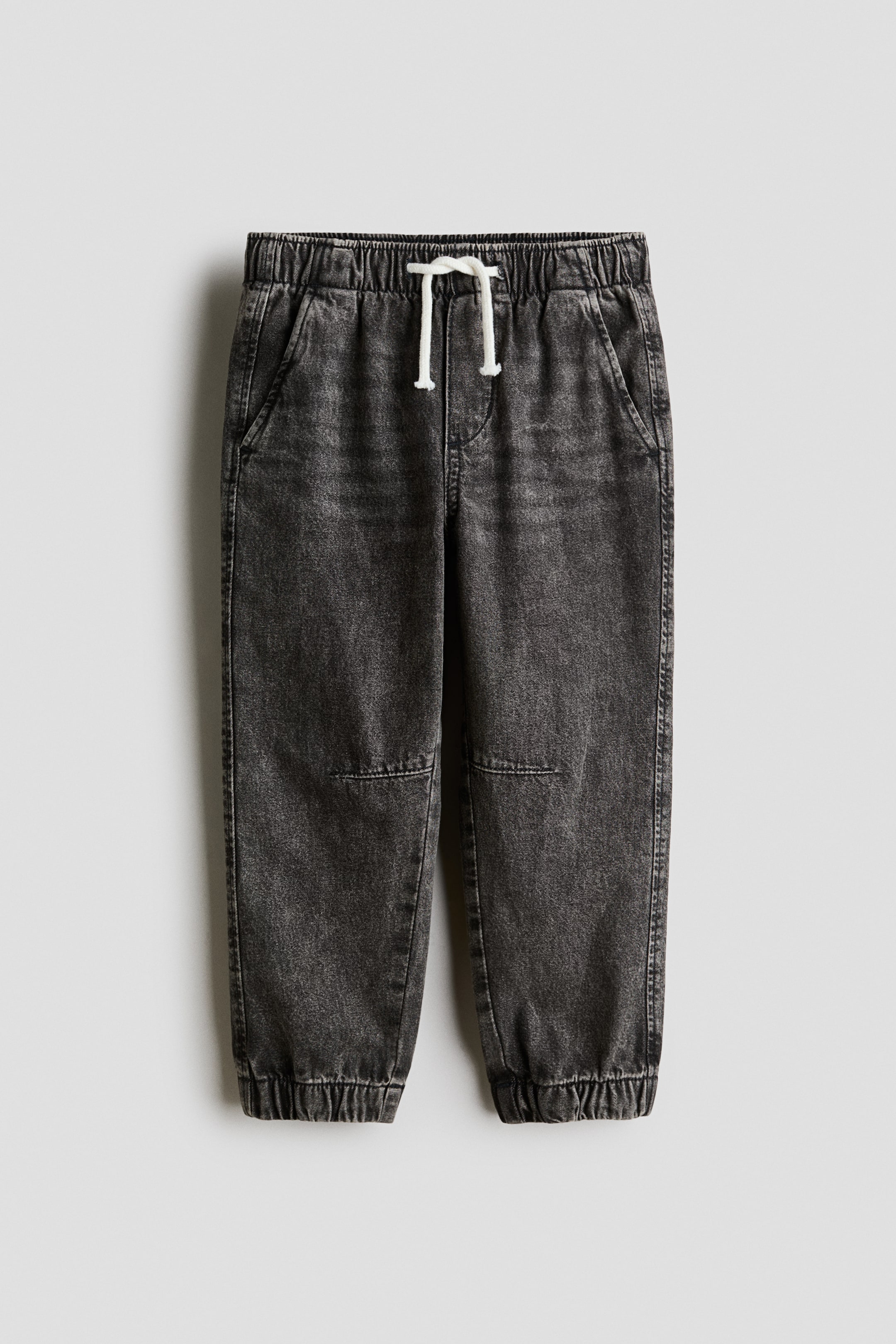 Visualizza immagine più grande: Joggers in denim di cotone - Grigio denim scuro - BAMBINO | H&M IT 1