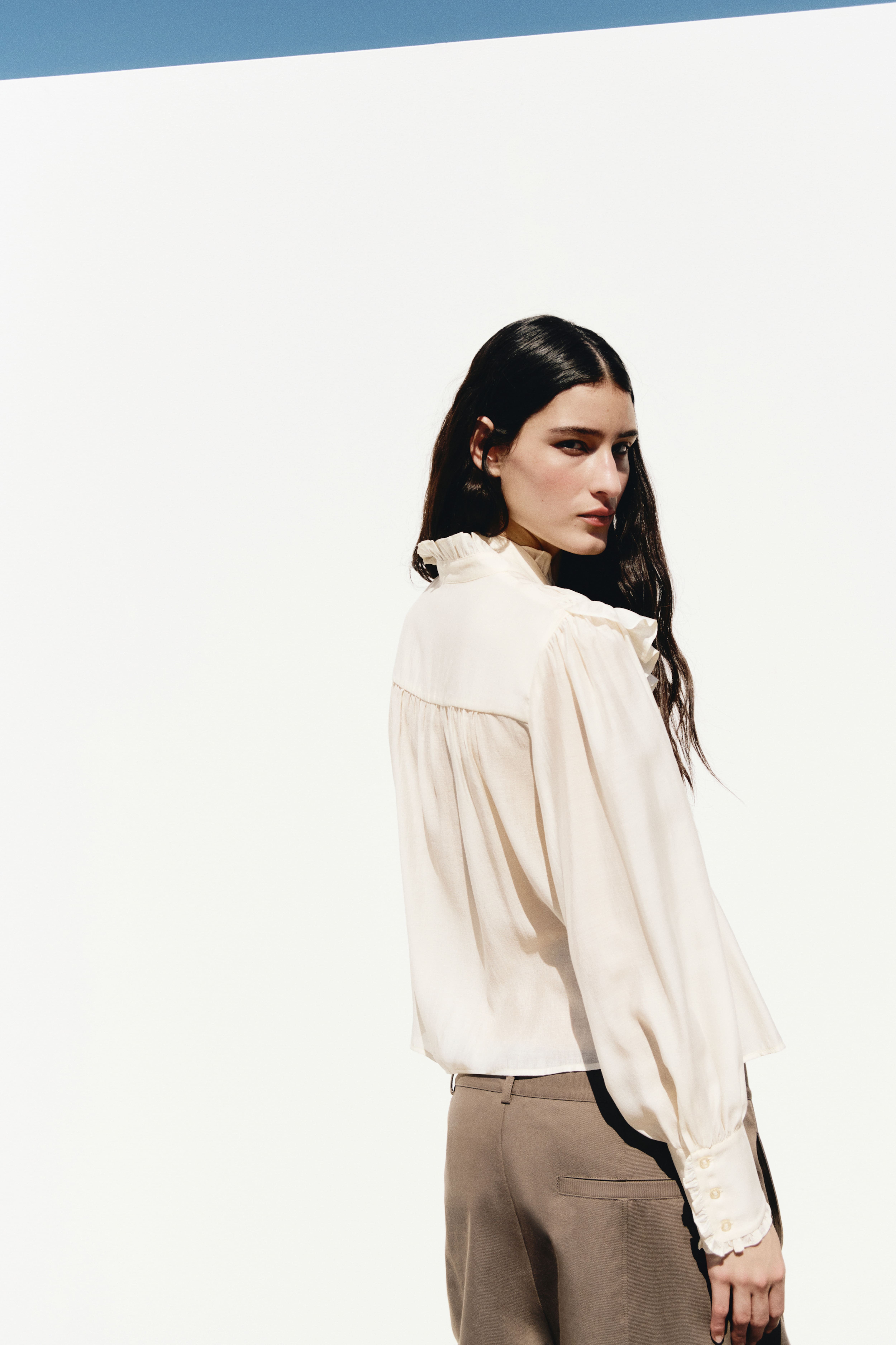 Ruffle-Trimmed Tie-Neck Blouse