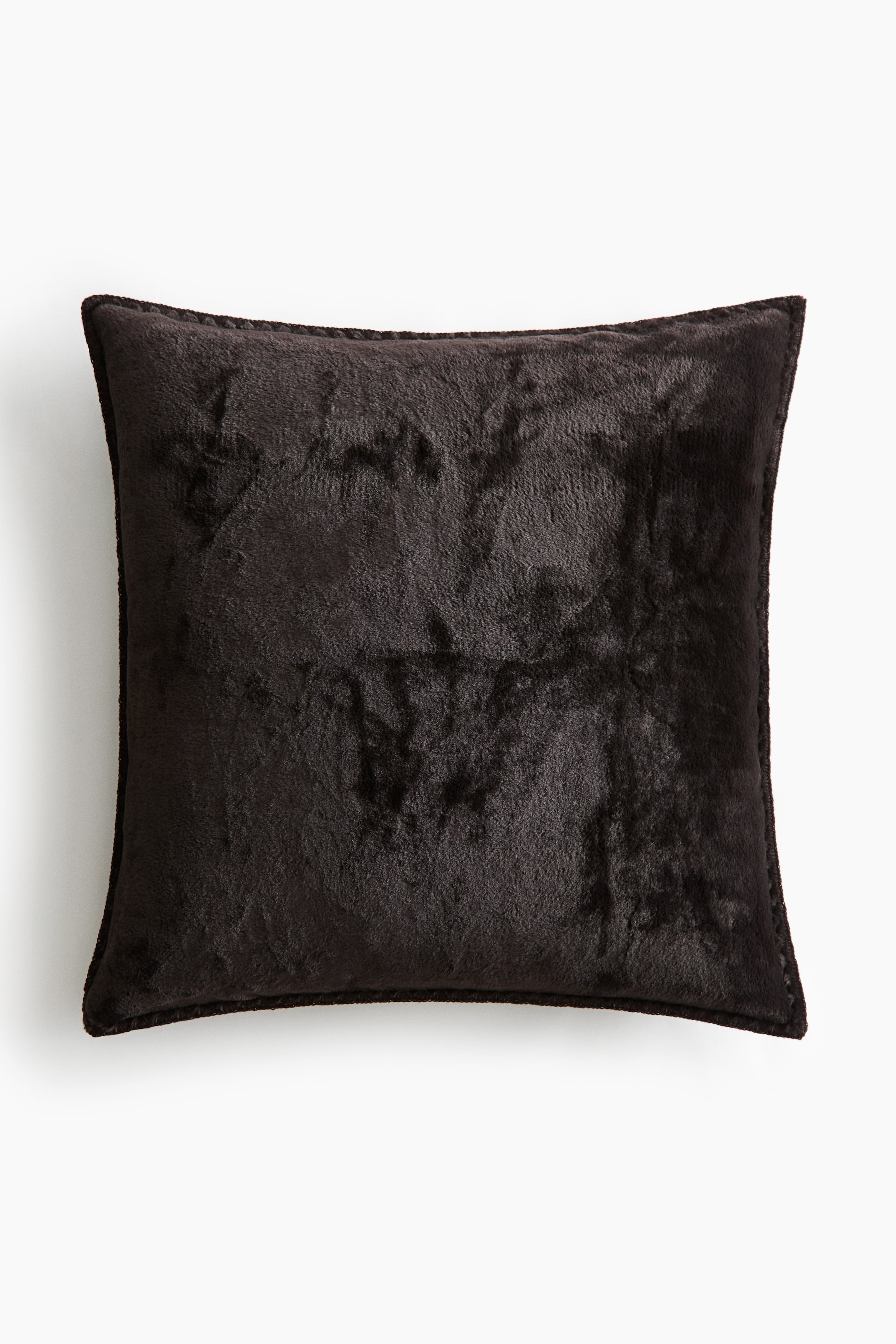 View larger image: A square throw pillow is facing forward, showcasing a plush dark brown faux-fur texture with a mottled appearance. The cushion features neat stitched edges and a soft, dense pile that creates subtle highlights and shadows across its surface.