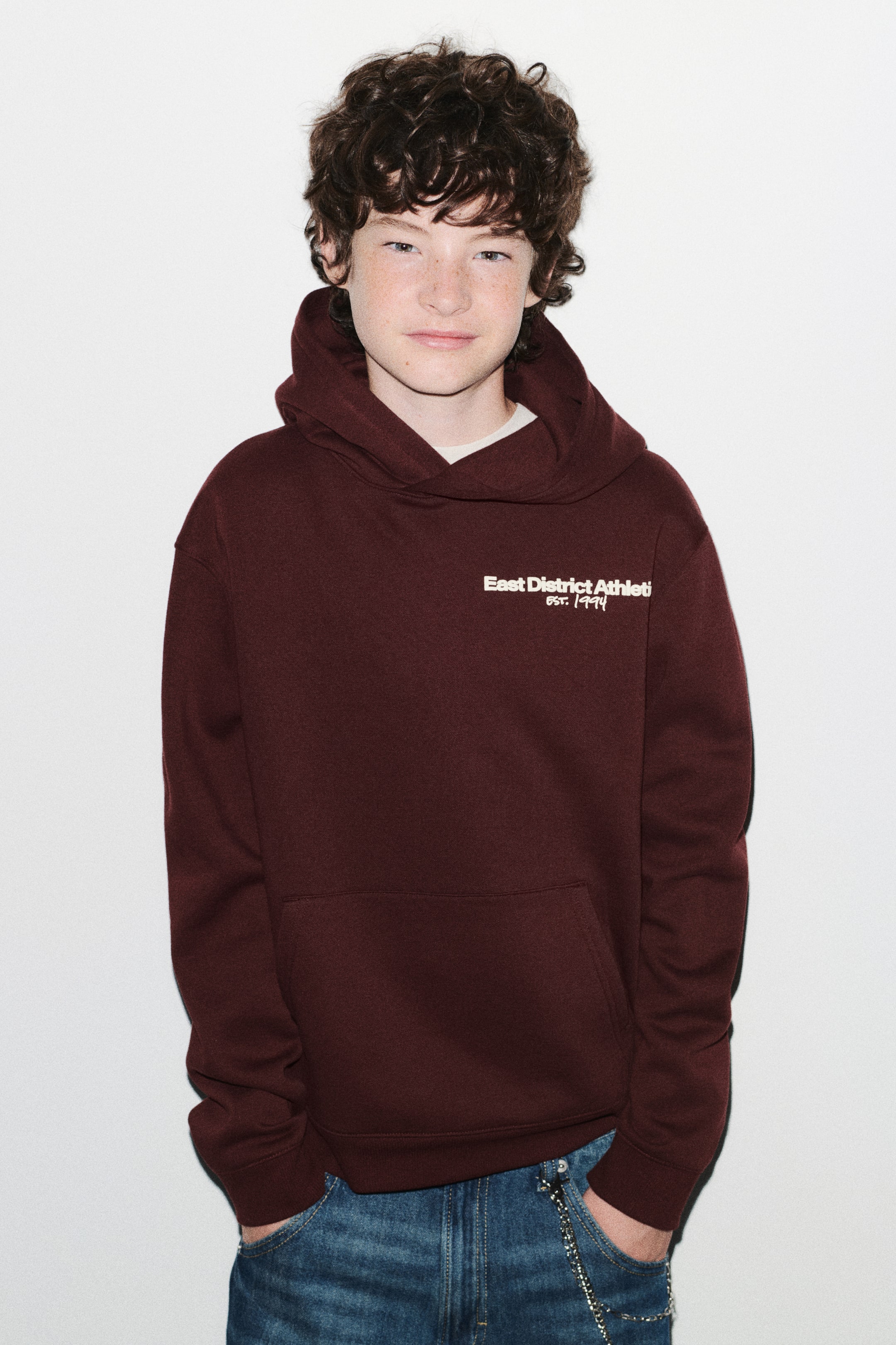 View larger image: Print-motif brushed-inside hoodie - Dark red/Athletics - Kids | H&M 1