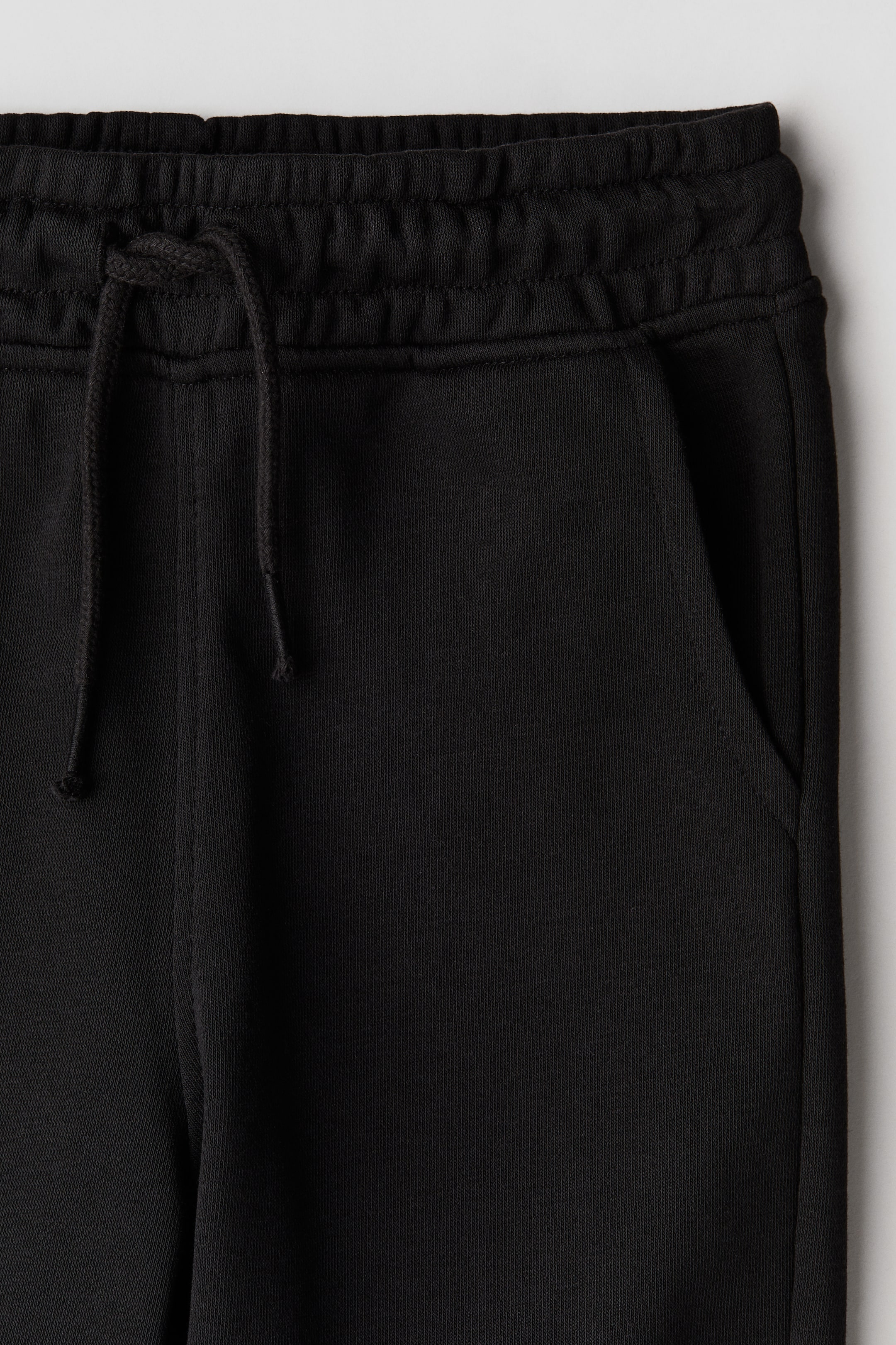 Sweatshirt shorts - Regular waist - Knee length - Black - Kids | H&M GB