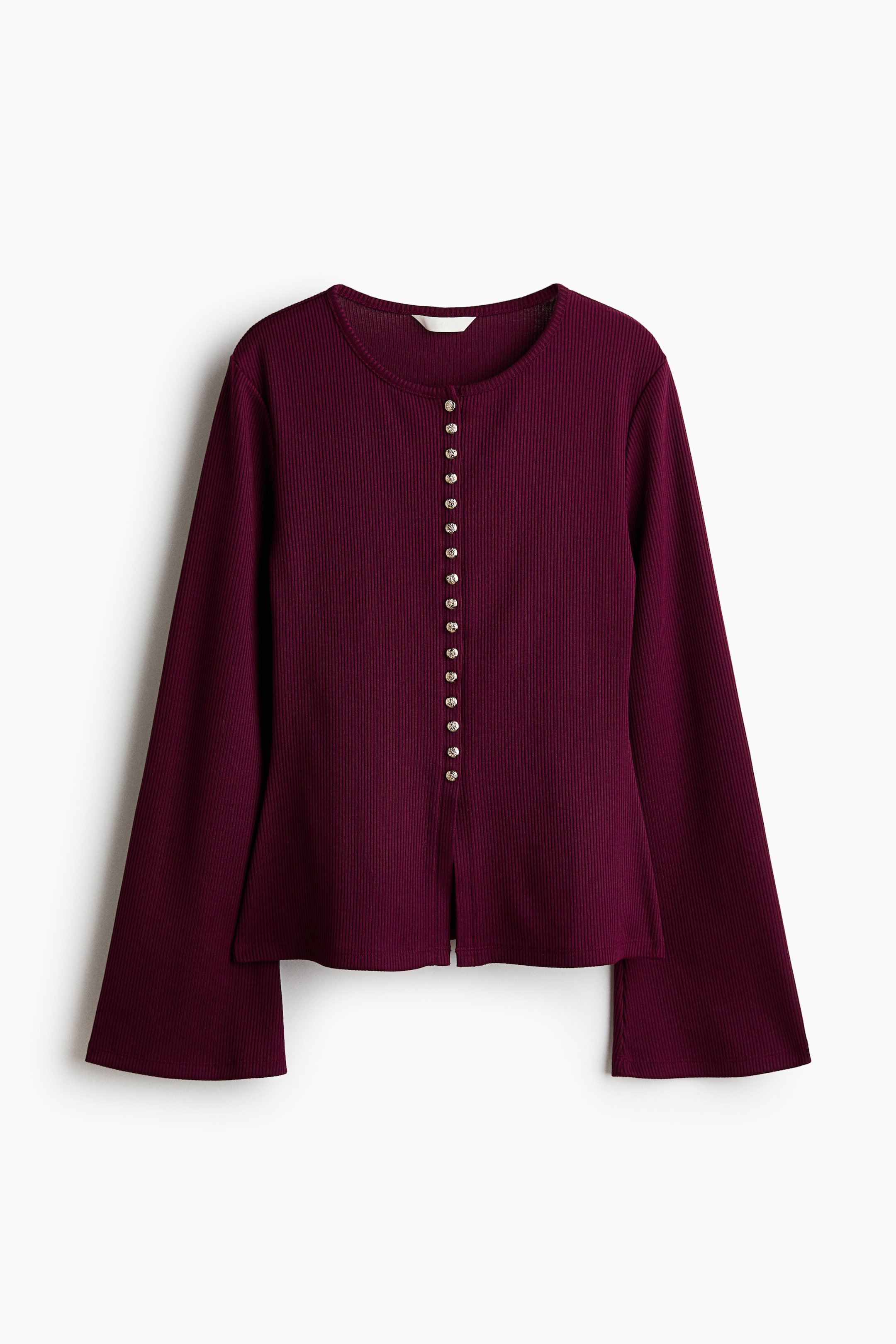 View larger image: A deep red ribbed knit top featuring a round neckline and a full front button placket with small, shiny buttons. It is designed with long flared sleeves and a straight hem that splits slightly at the bottom of the button placket.