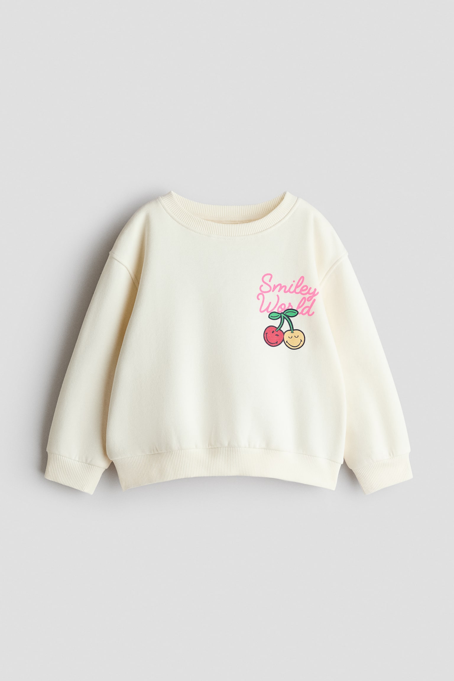 Sweatshirt mit Motiv - Cremefarben/SmileyWorld®/Schwarz/Lilo & Stitch/Weiss/Minnie Maus/Hellrosa/CapyFun/Weiss/Minnie Maus/Hellrosa/Hello Kitty/Cremefarben/Lilo & Stitch