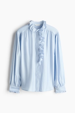 Blus med volang och knäppning fram