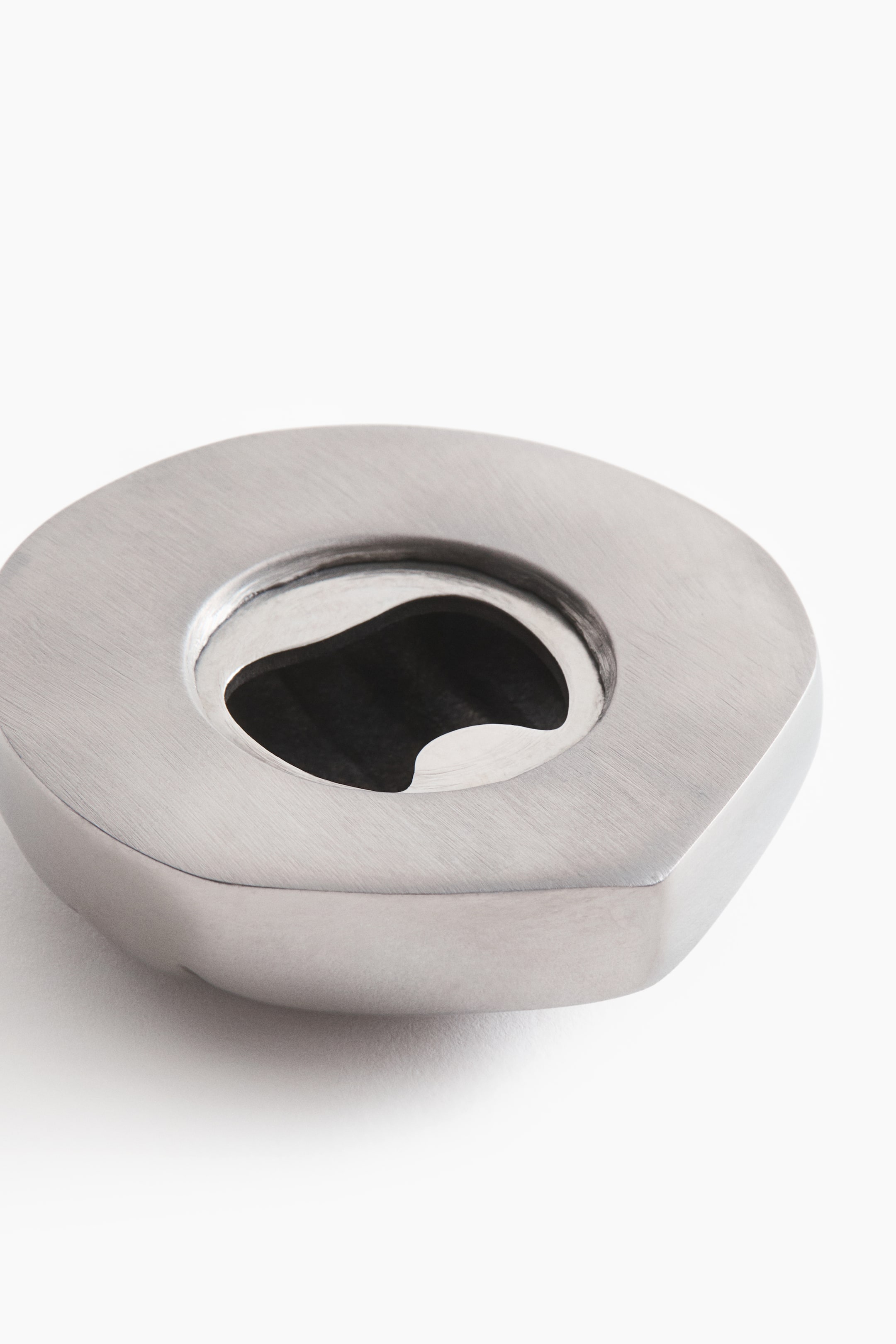 Seashell-shaped bottle opener