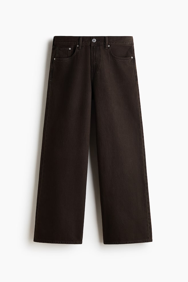 A front view of dark brown, wide-leg denim jeans displaying a classic five-pocket design, belt loops, and a metal button closure at the regular waist. The jeans are hanging flat, showcasing a loose-fitting silhouette with wide legs. - 1