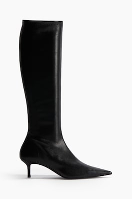 Sockboots i läder med klack
