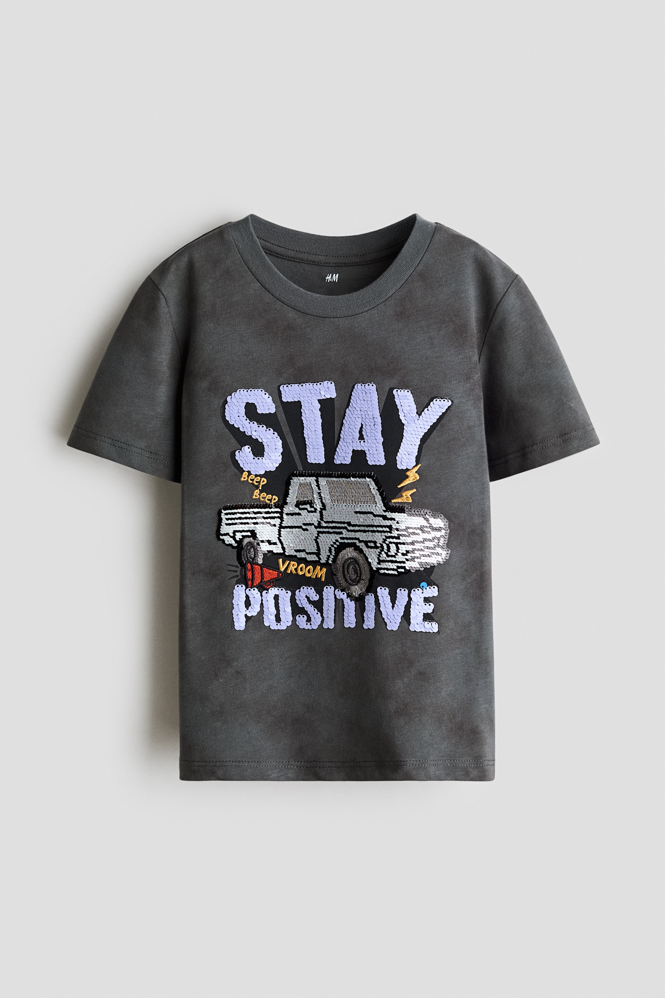 리버서블 시퀸 디테일 티셔츠 - 다크 그레이/Stay Positive/크림/자동차