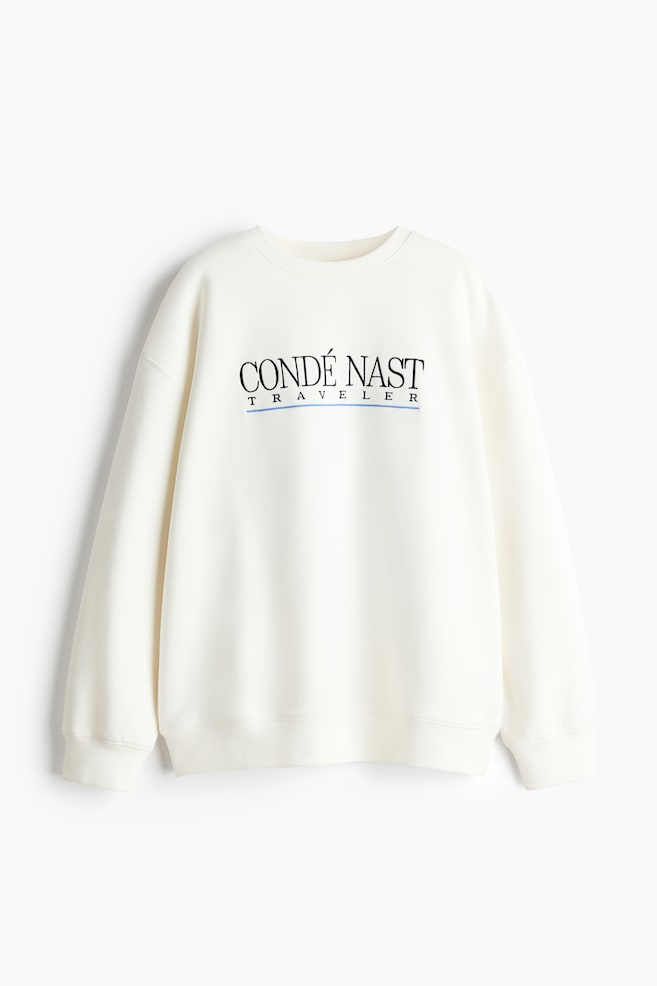 Oversized sweatshirt med tryk - Hvid/Condé Nast Traveller/Mørkebrun/David Bowie/Creme/Condé Nast Traveller/Blå/The Smashing Pumpkins/Støvet blå/The Rolling Stones - 1