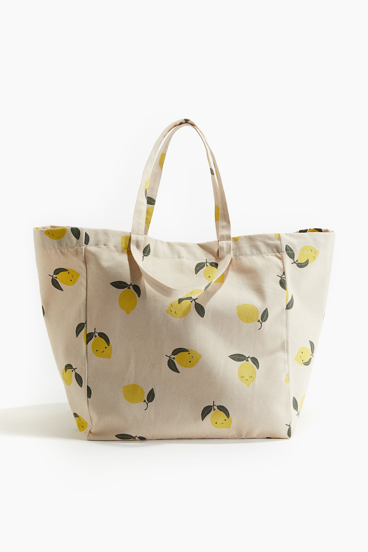 Light beige/lemons Patterned Beach Bag at H&M Home | H&M US
