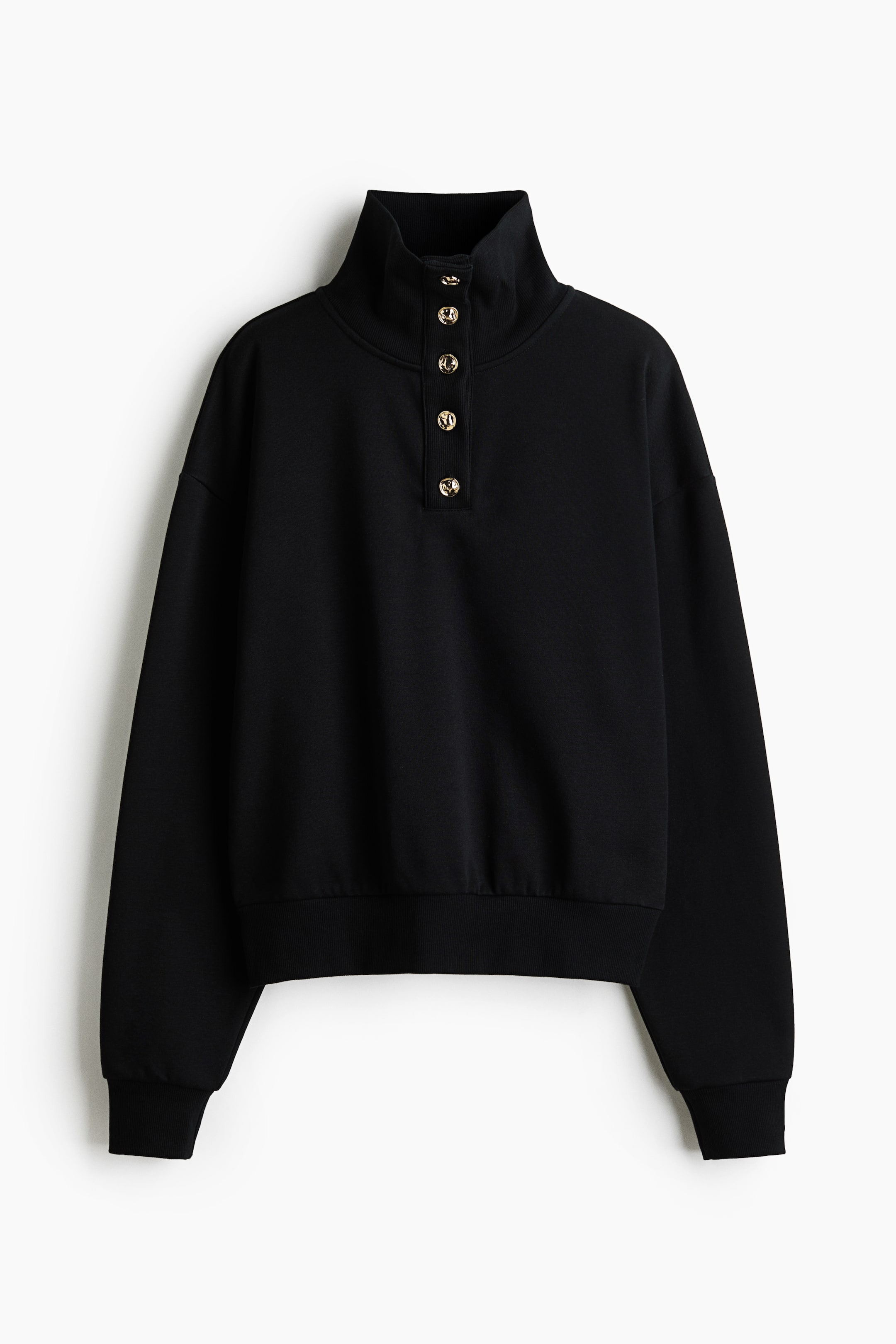 View larger image: A black sweatshirt is shown from the front, featuring a high ribbed collar with a partial placket and five decorative gold-tone buttons. The garment showcases a relaxed silhouette with dropped shoulders, ribbed cuffs, and a ribbed hem.