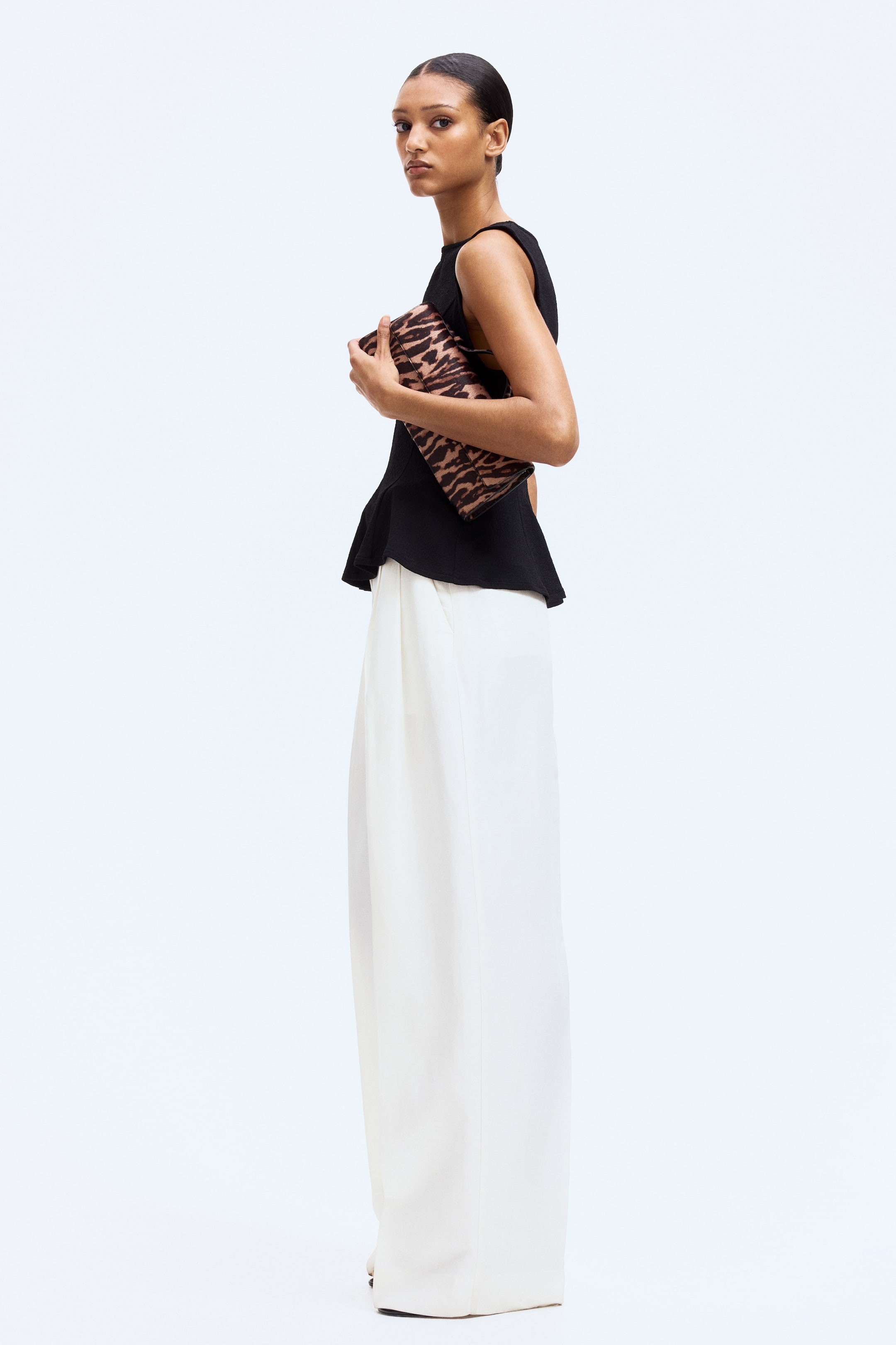 View larger image: Sleeveless peplum top - Black - Ladies | H&M IN 1