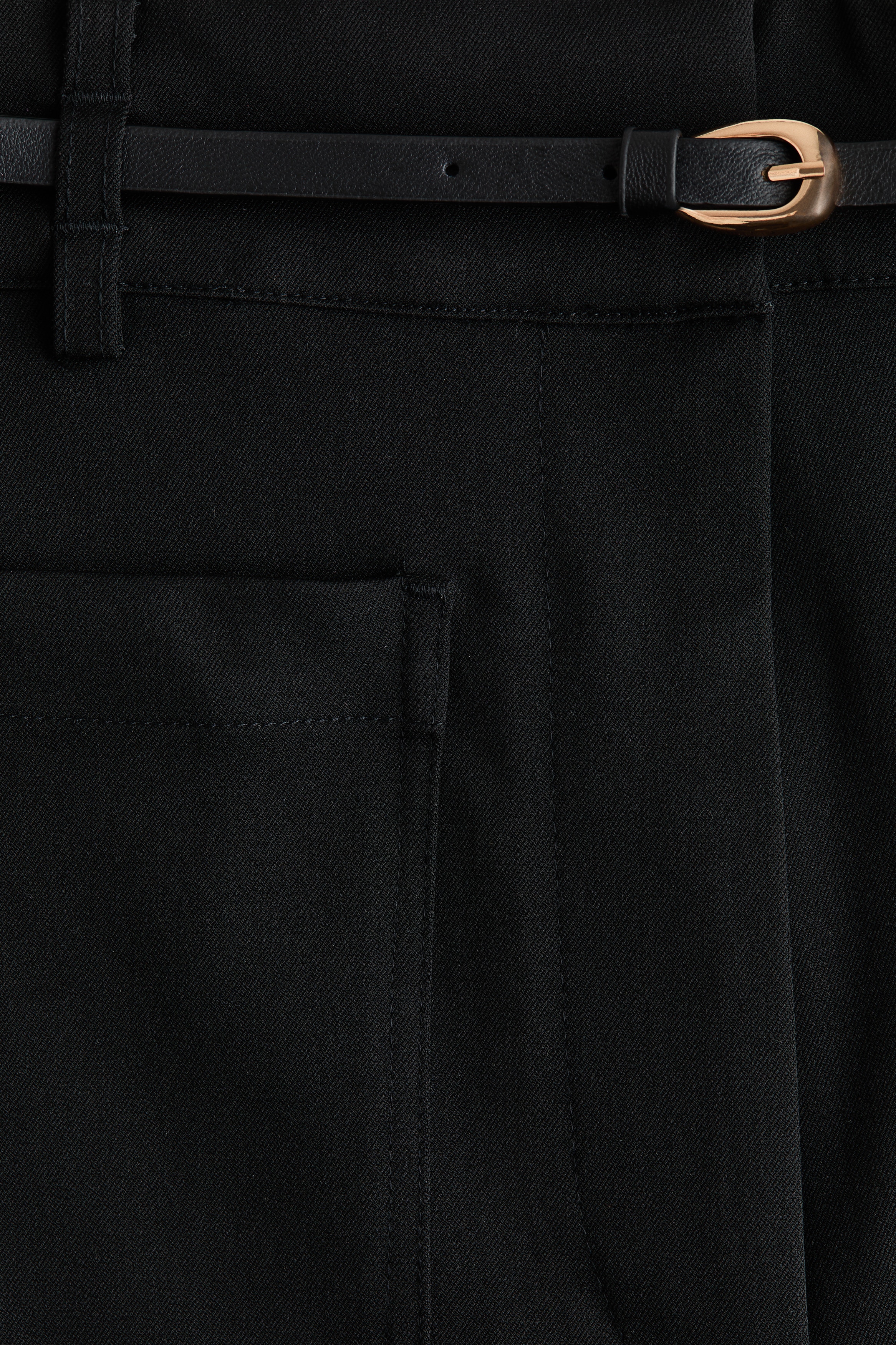 Flared belted trousers