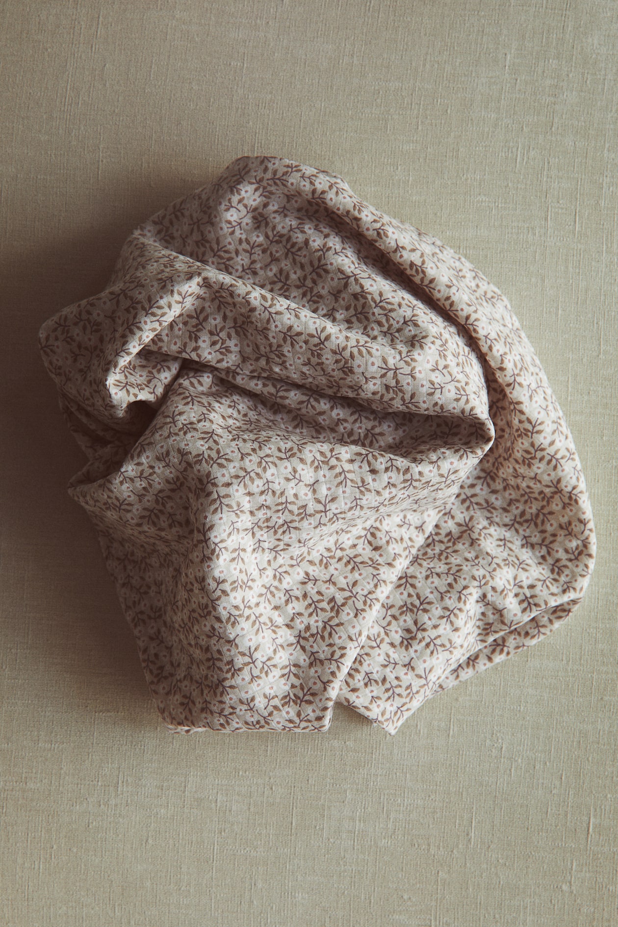 Light dusty beige/floral Cotton Muslin Baby Blanket at H&M Home | H&M US