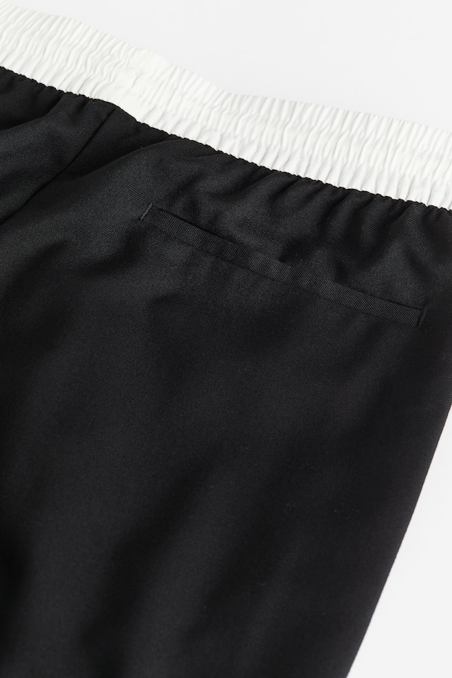 Pantalon large avec taille élastique - Noir/blanc/Gris chiné/Noir/Beige clair - 4