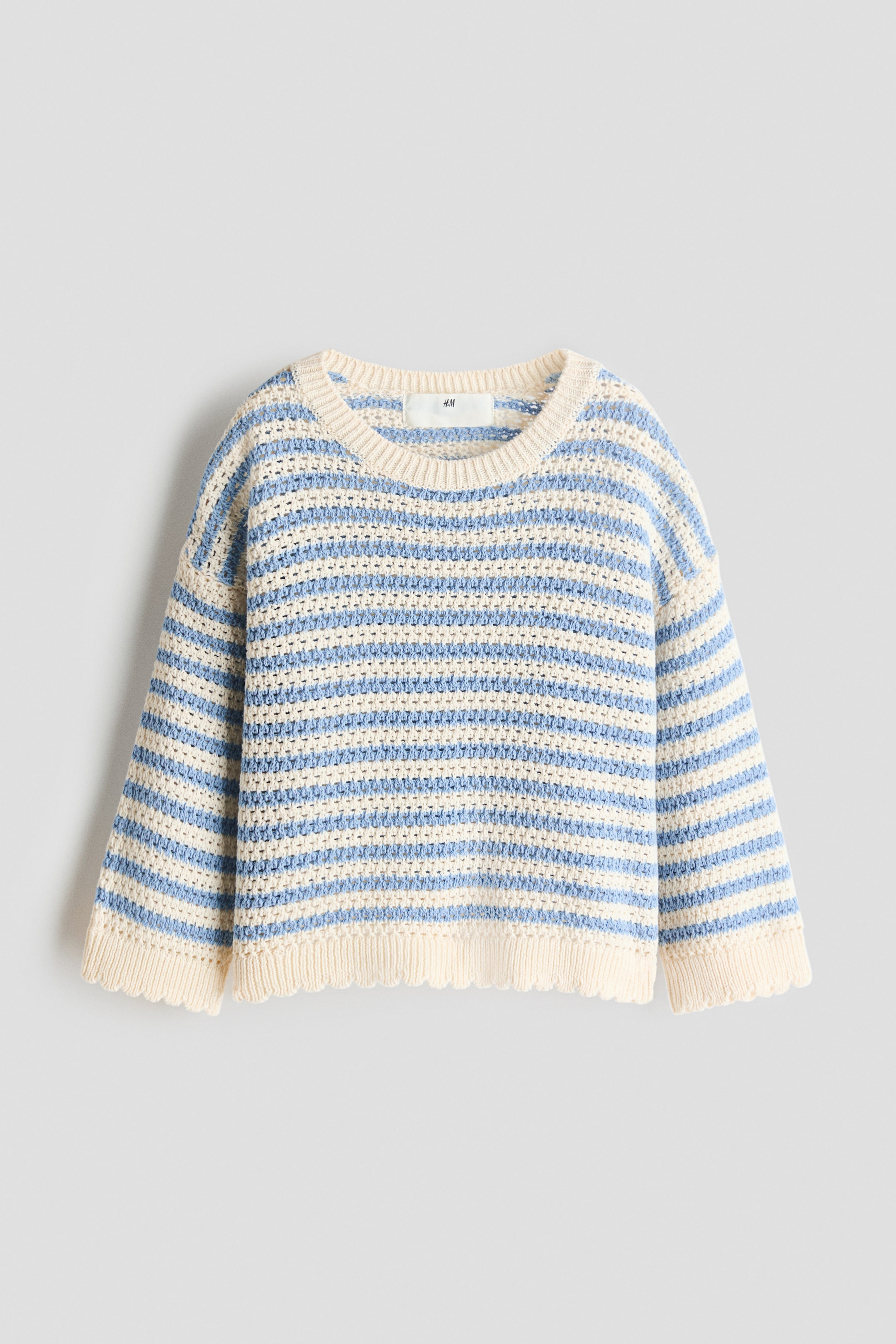 View larger image: The jumper is displaying its front, featuring a textured-knit construction with alternating light blue and cream horizontal stripes. It is designed with a round, rib-trimmed neckline, dropped shoulders, and scalloped ribbing at the cuffs and hem.