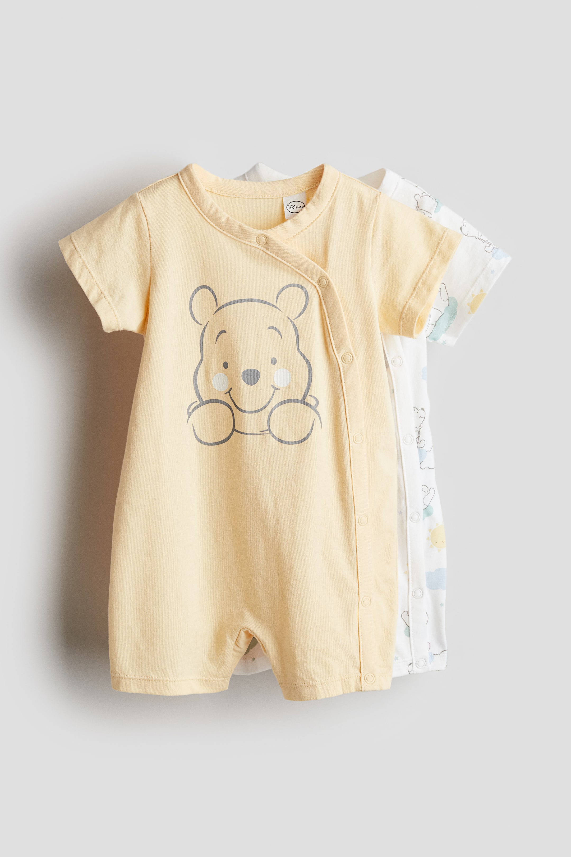 2-pack printed pyjamas - Light yellow/Winnie the Pooh - Kids | H&M GB