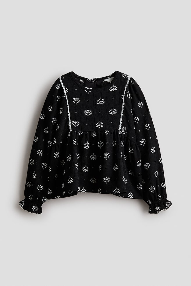 Blouse en jersey texturé - Noir/fleuri - 1