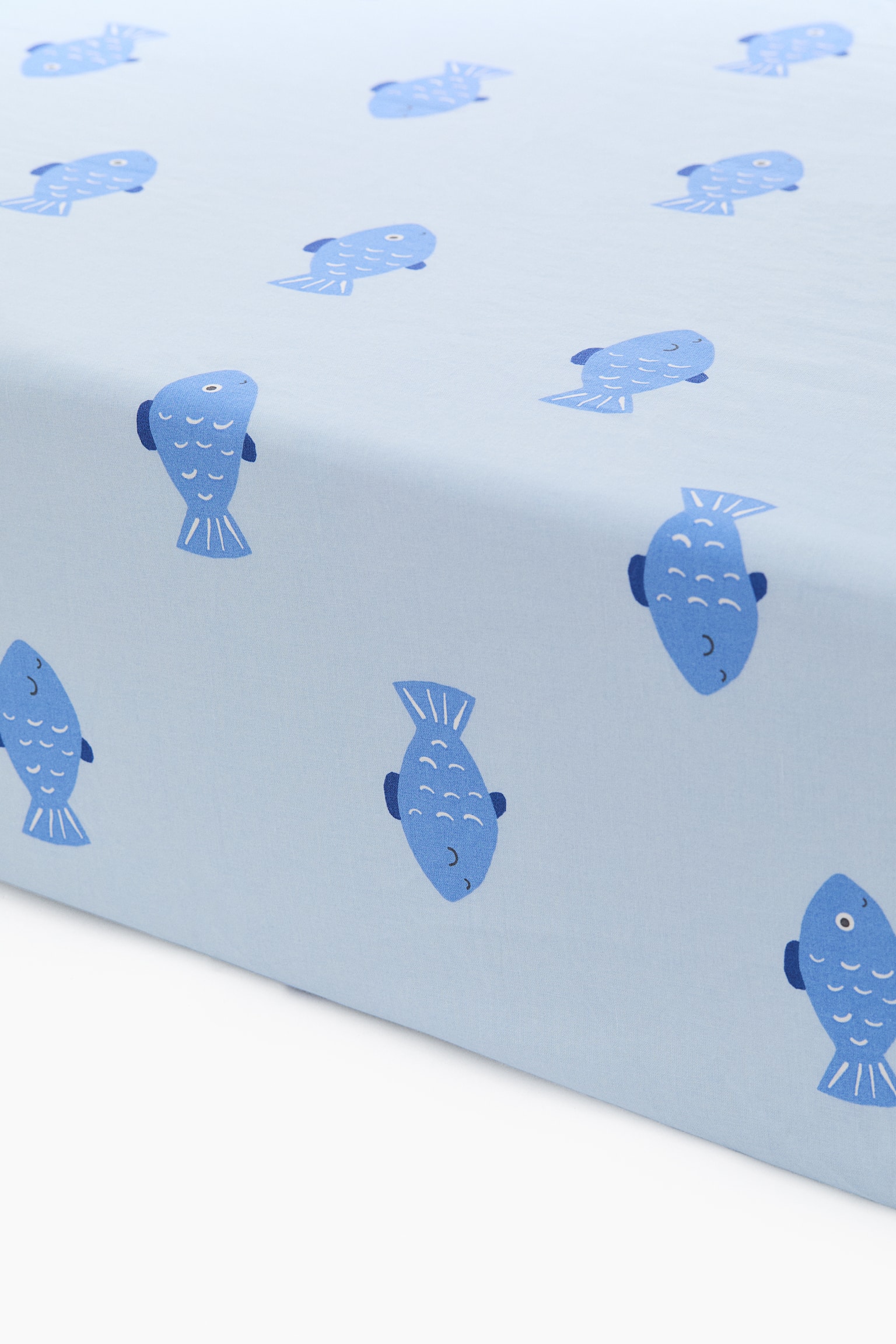 Patterned Cotton Fitted Sheet - Light blue/fish/White/dotted/Pink/fruit/Light green/vehicles/White/hearts/Light beige/dinosaurs/Light beige/unicorns/Green/dinosaurs/Light yellow/oranges/Green/clover