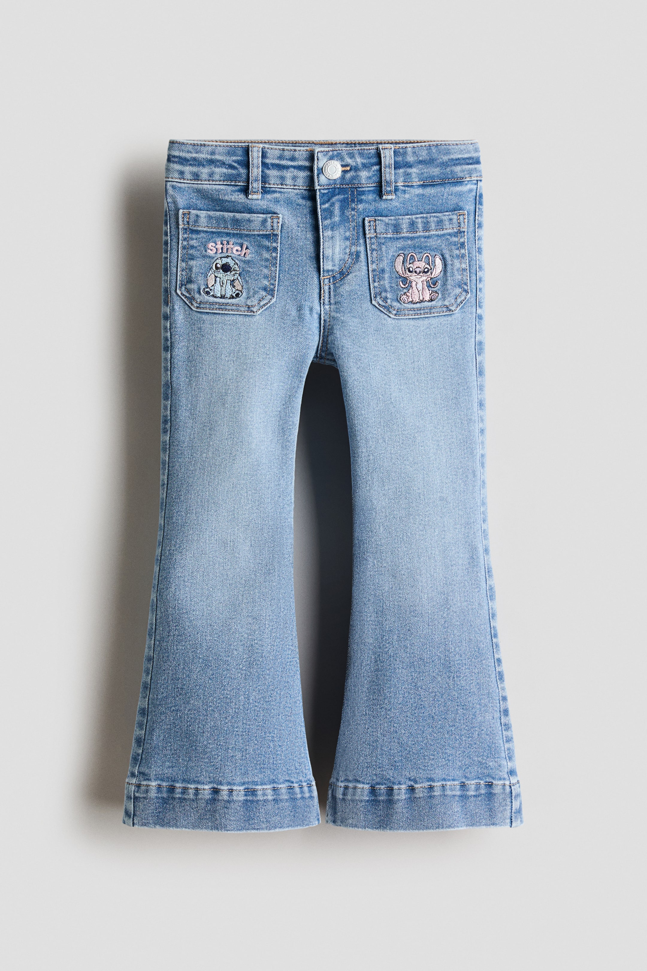 Se større billede: Jeans med svaj og broderier - Denimblå/Lilo & Stitch - BØRN | H&M DK 1