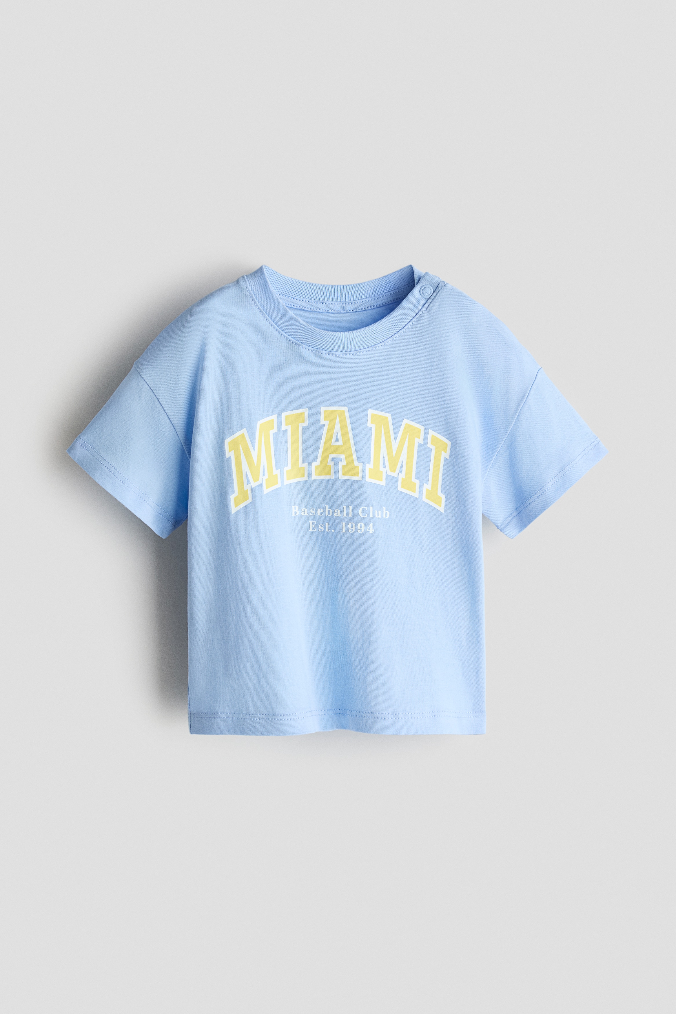 H & M – Katoenen T-shirt met print – Lichtblauw/Miami