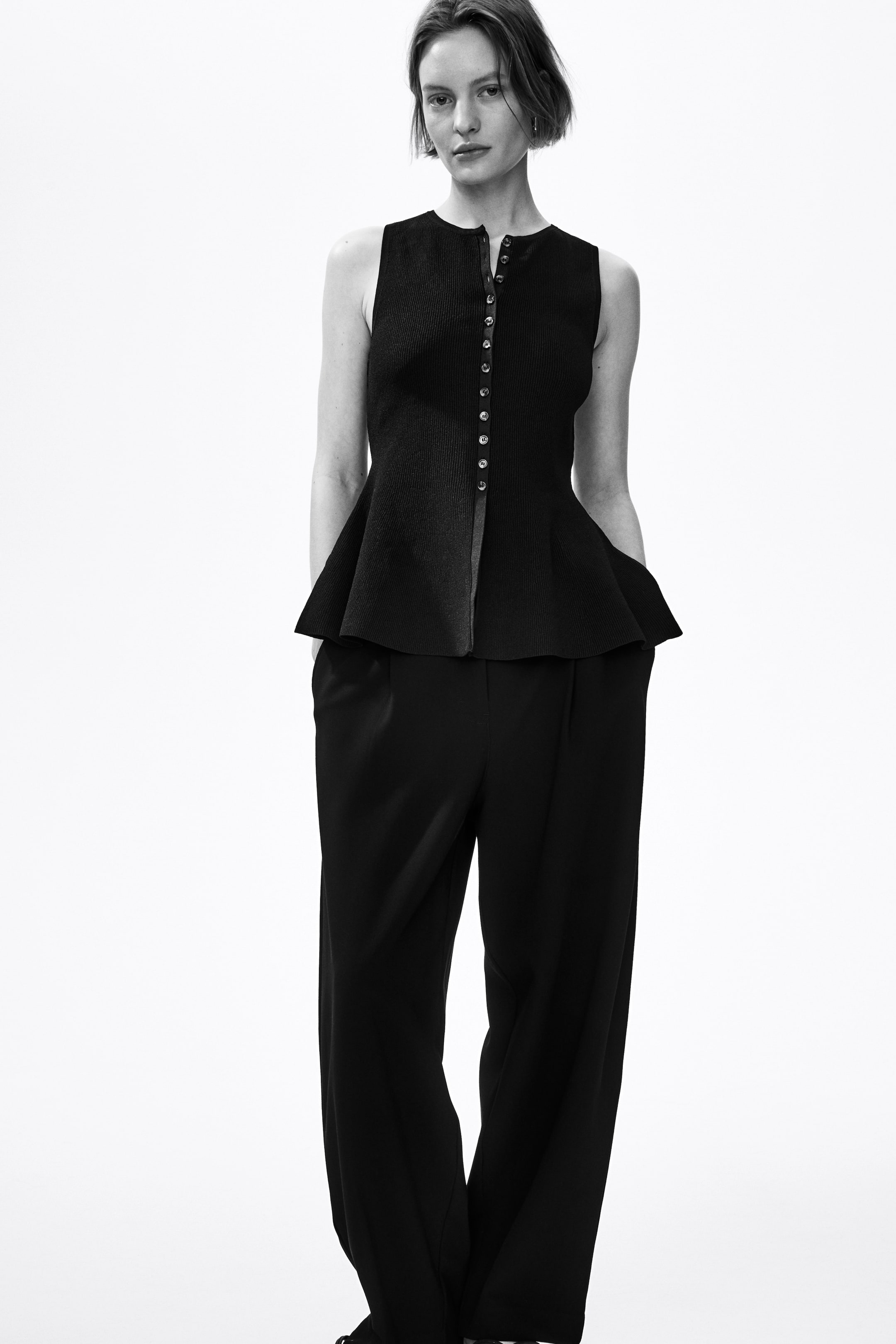 View larger image: Rib-knit peplum waistcoat - Black - Ladies | H&M 1