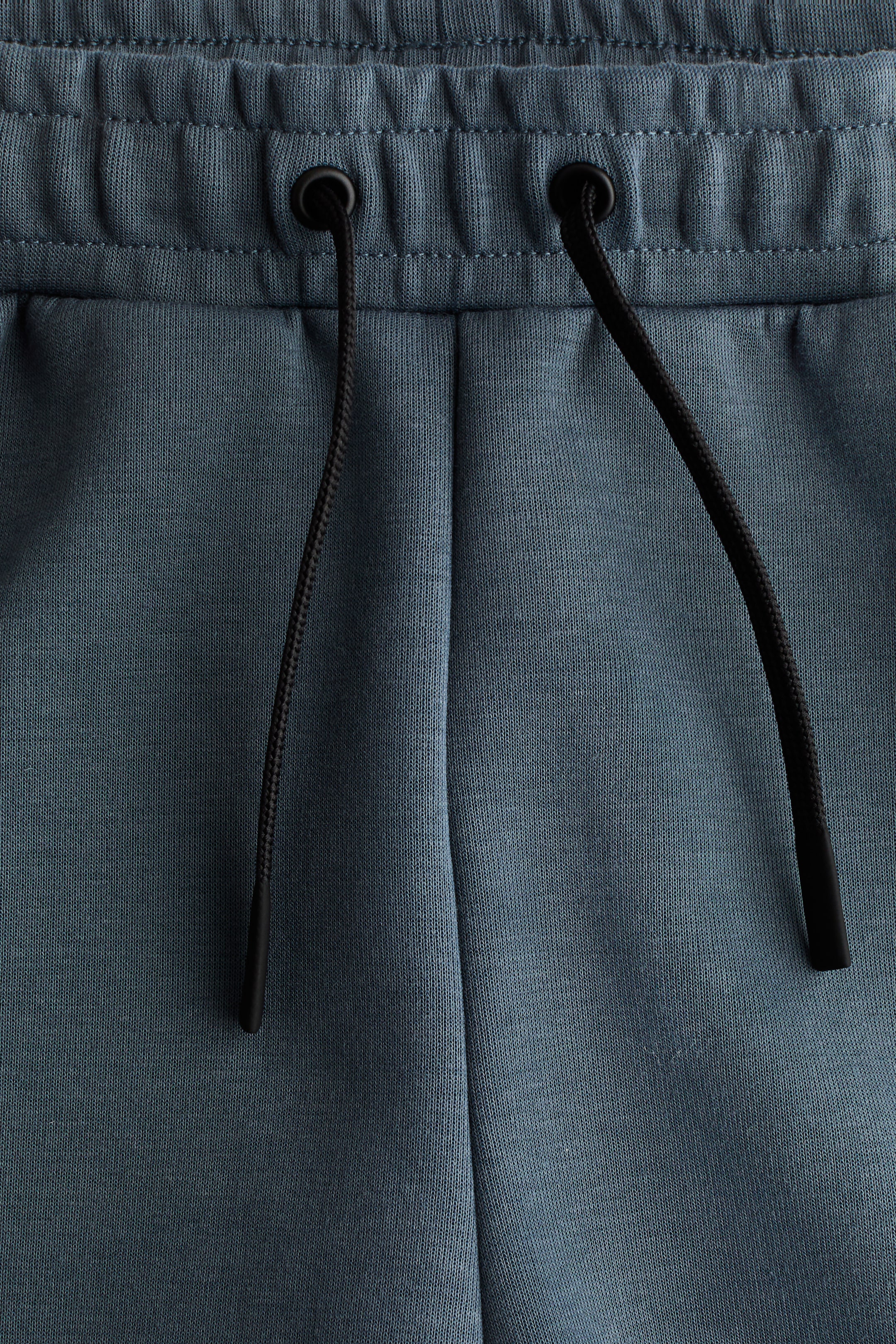 Ampliar la imagen: Relaxed Fit Sports joggers with DryMove™ - Azul cerceta - Kids | H&M MX 7