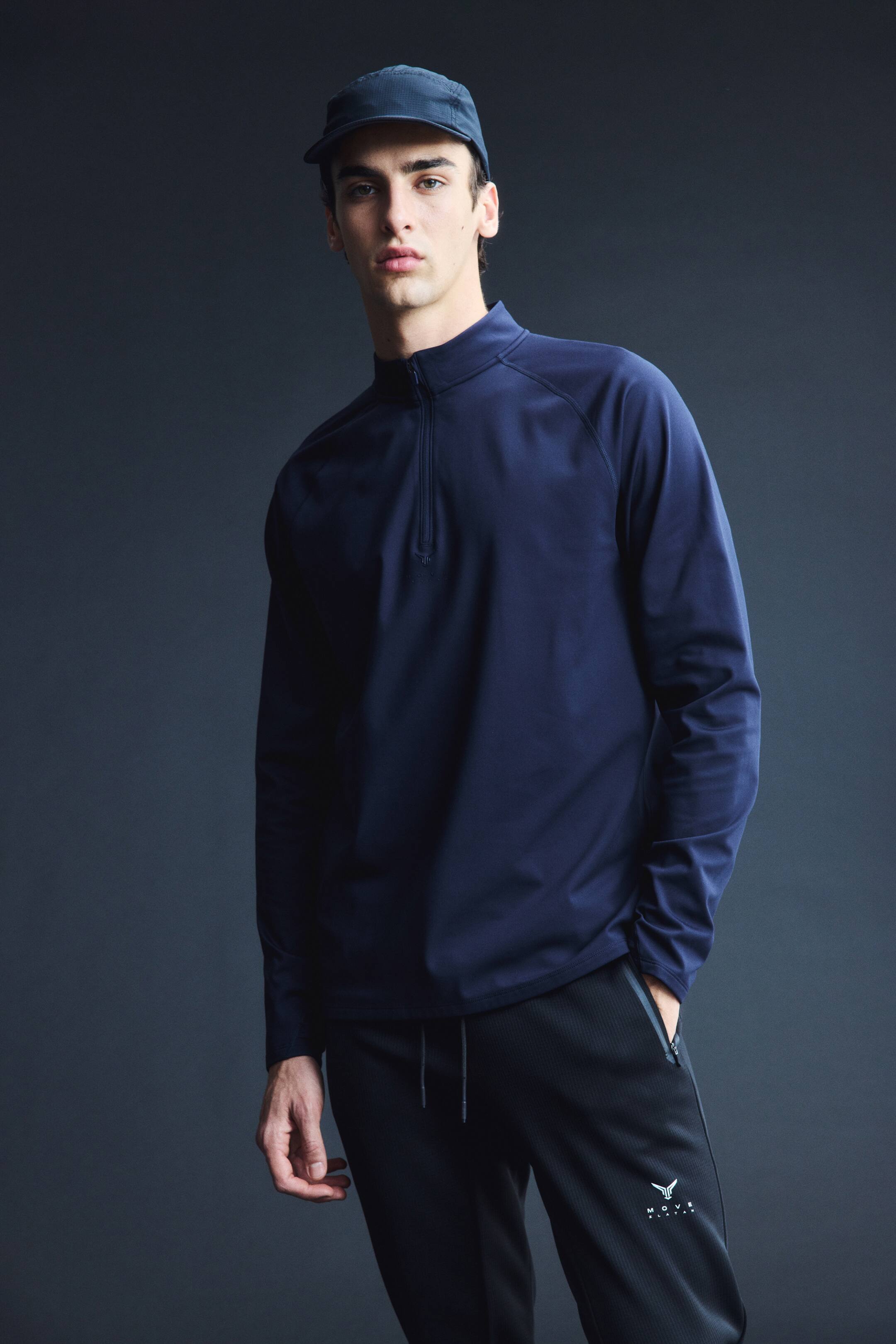 View larger image: Warming zip-top sports top with ThermoMove™ - Dark navy blue/Move Zlatan - Men | H&M IN 3