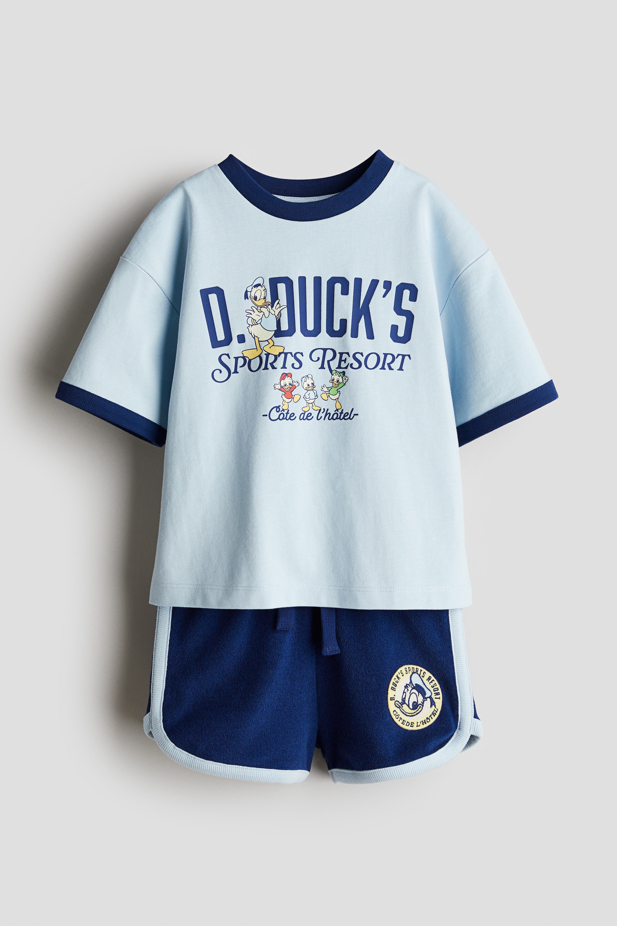 Conjunto con playera y shorts - Azul claro/Pato Donald