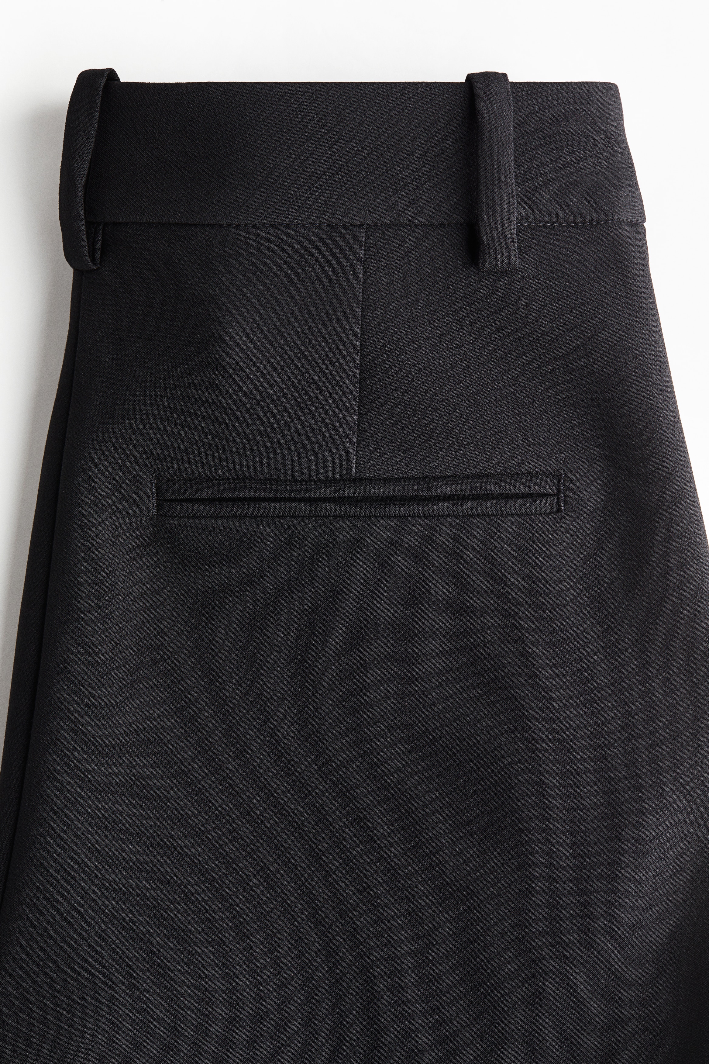 Flared crease-detail trousers