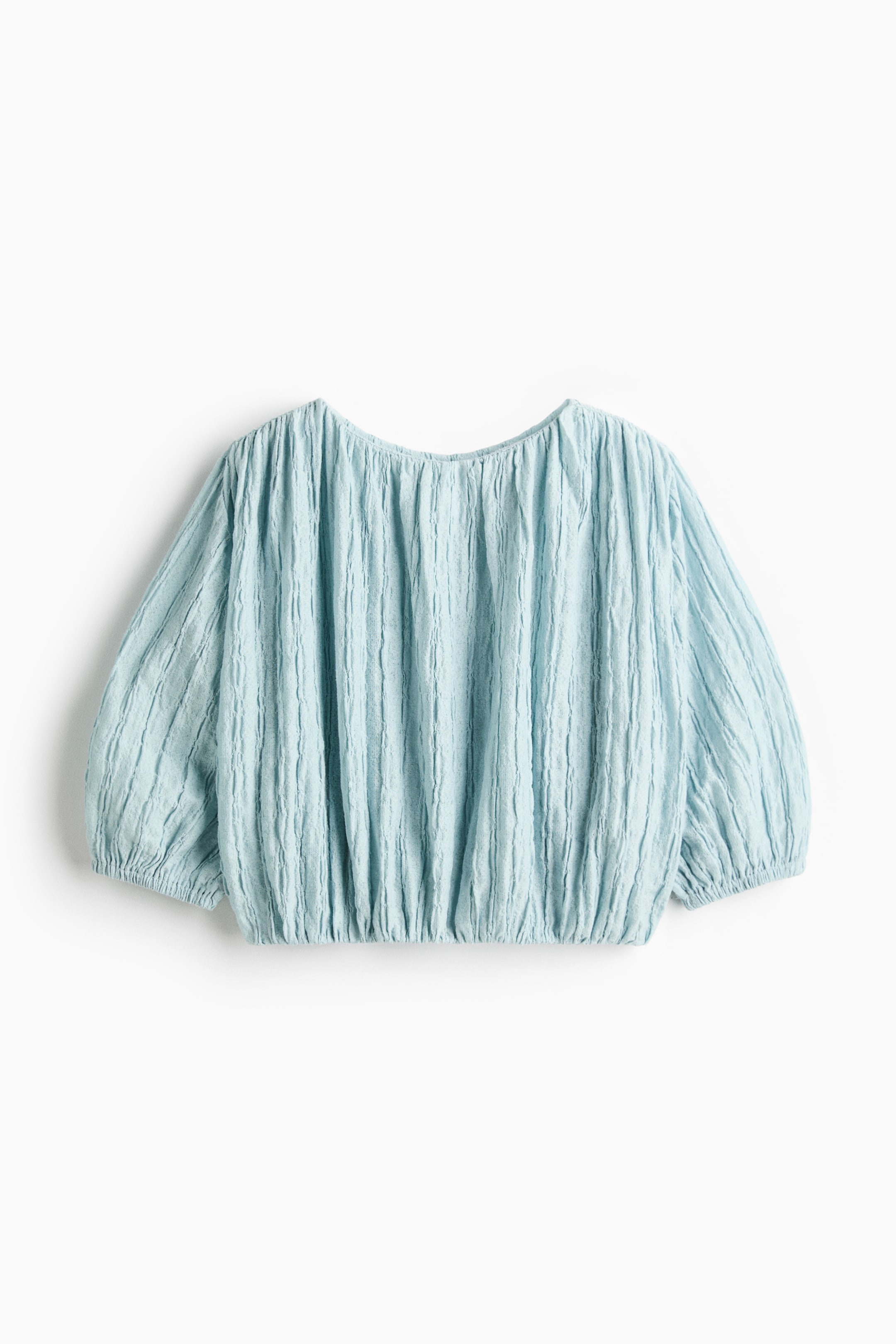Blouse texturée à bas effet bouffant